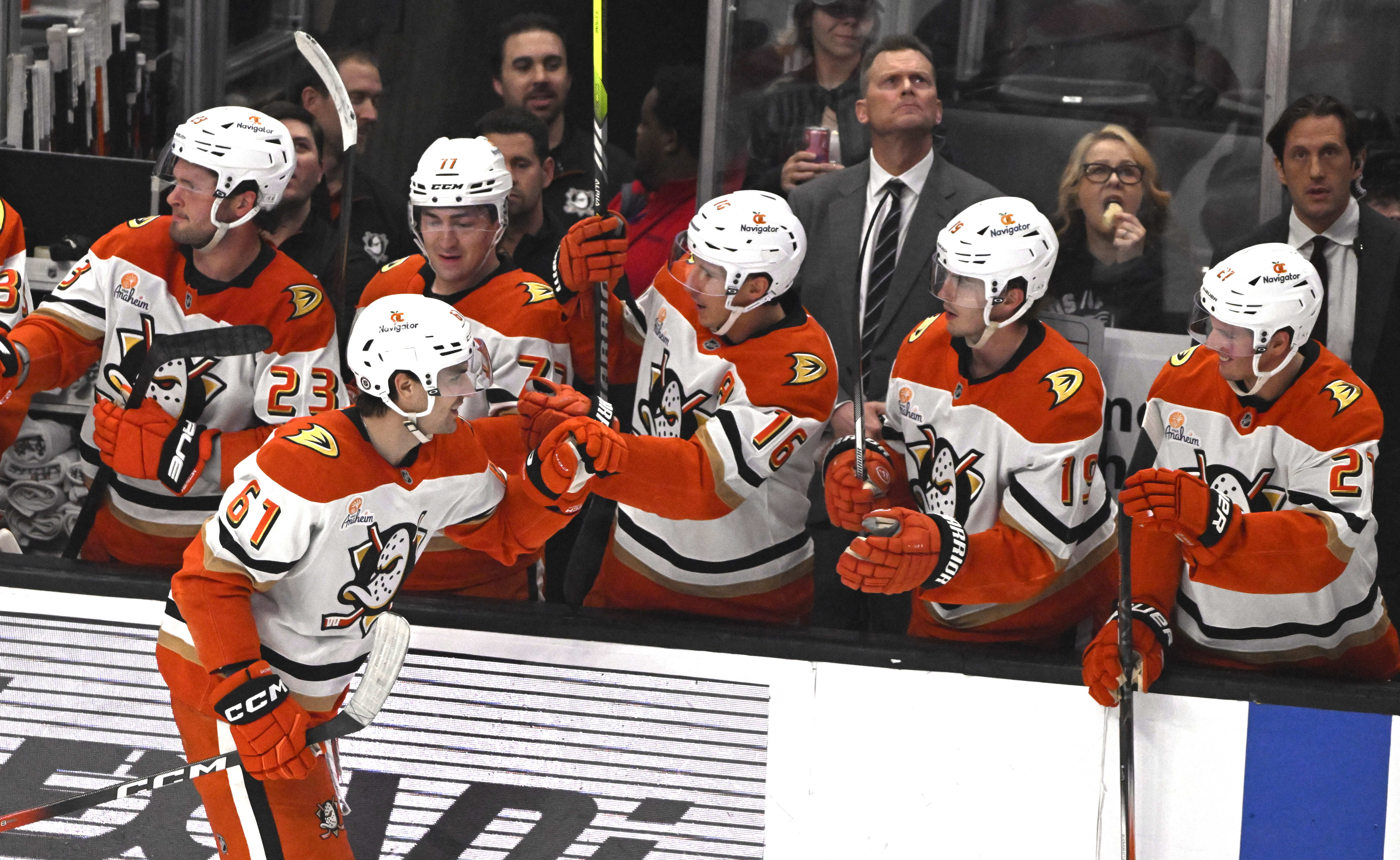 Ducks rookie Cutter Gauthier (61) celebrates with teammates on the...