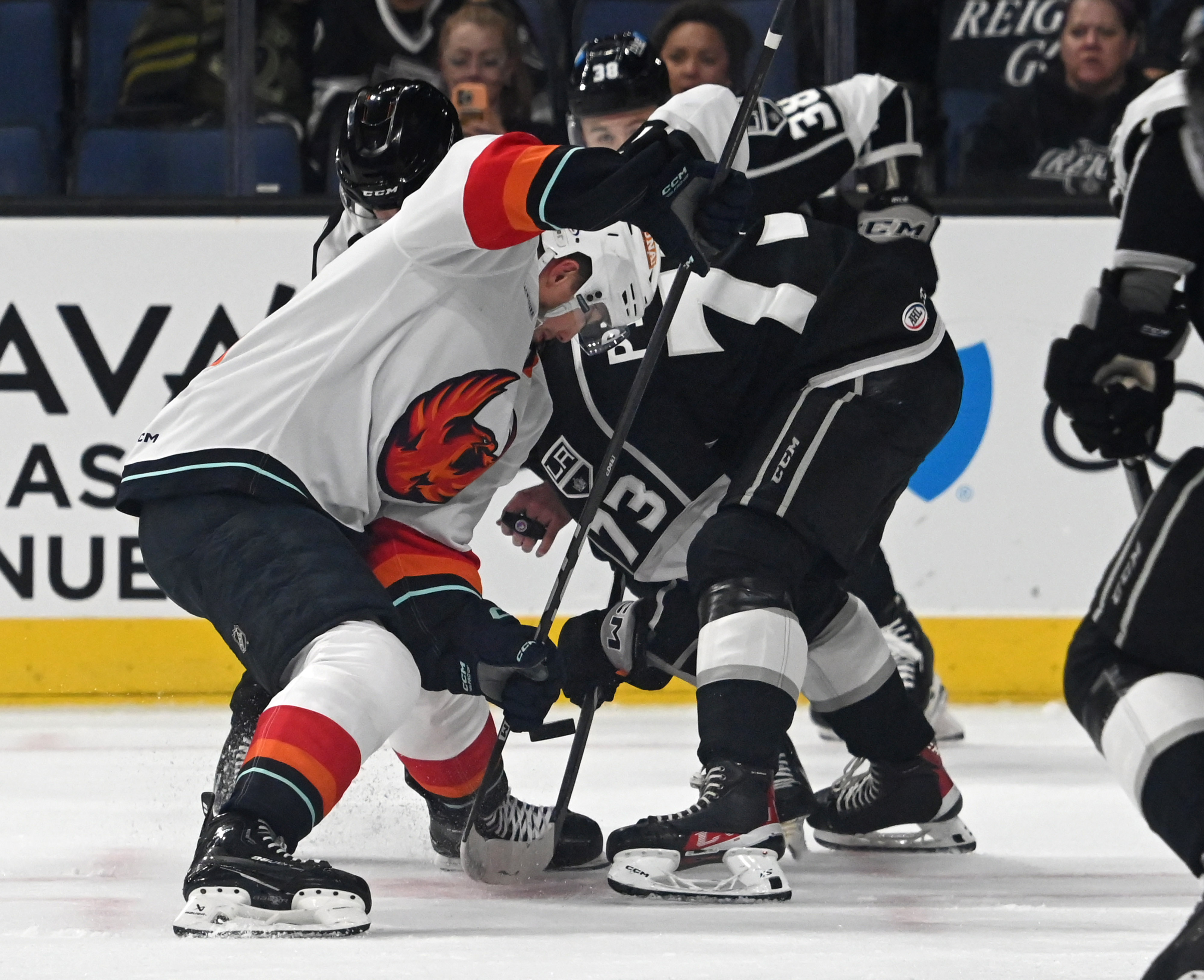 Coachella Valley Firebirds’ Luke Henman and Ontario Reign’s Francesco Pinelli...