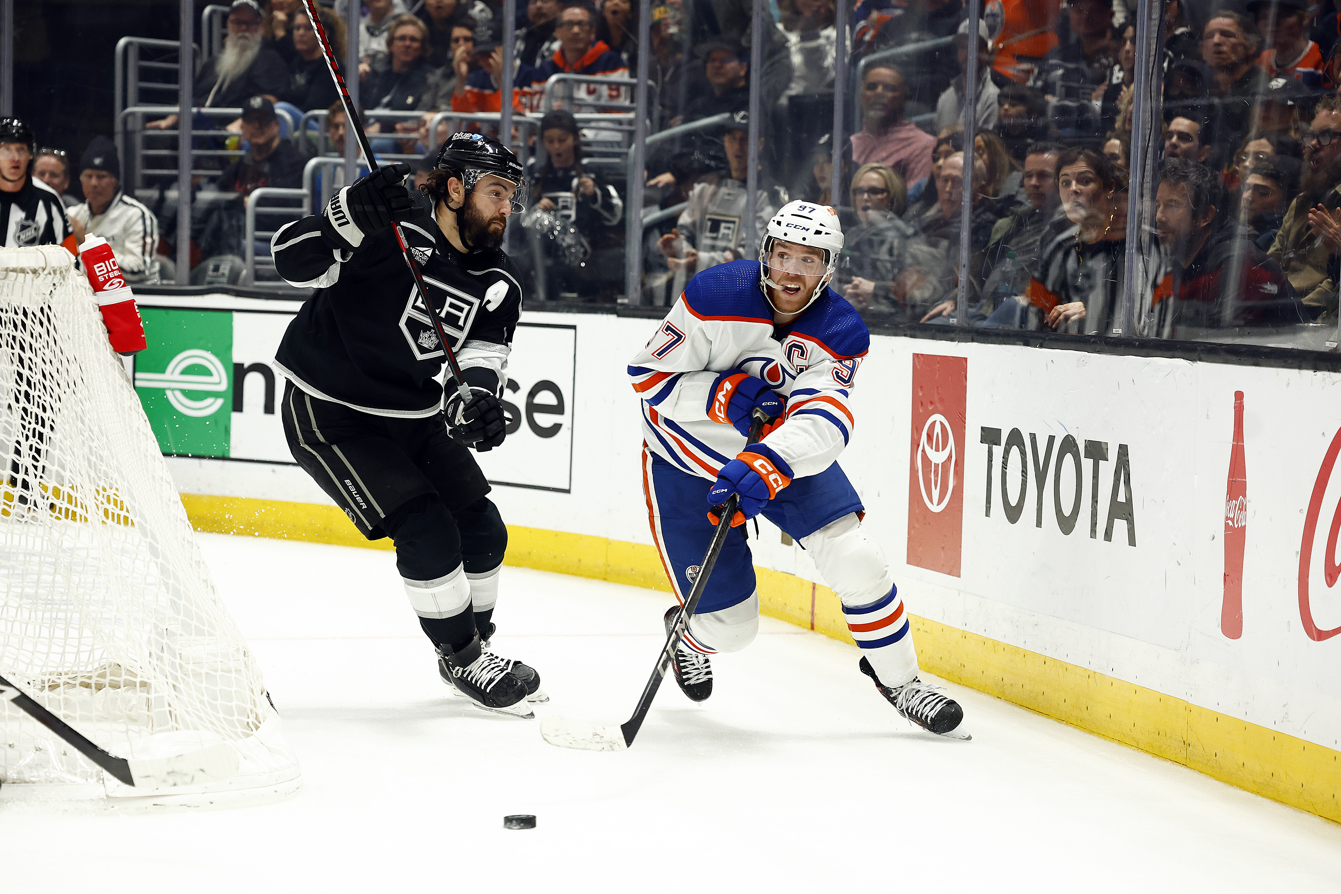 Connor McDavid #97 of the Edmonton Oilers skates the puck...