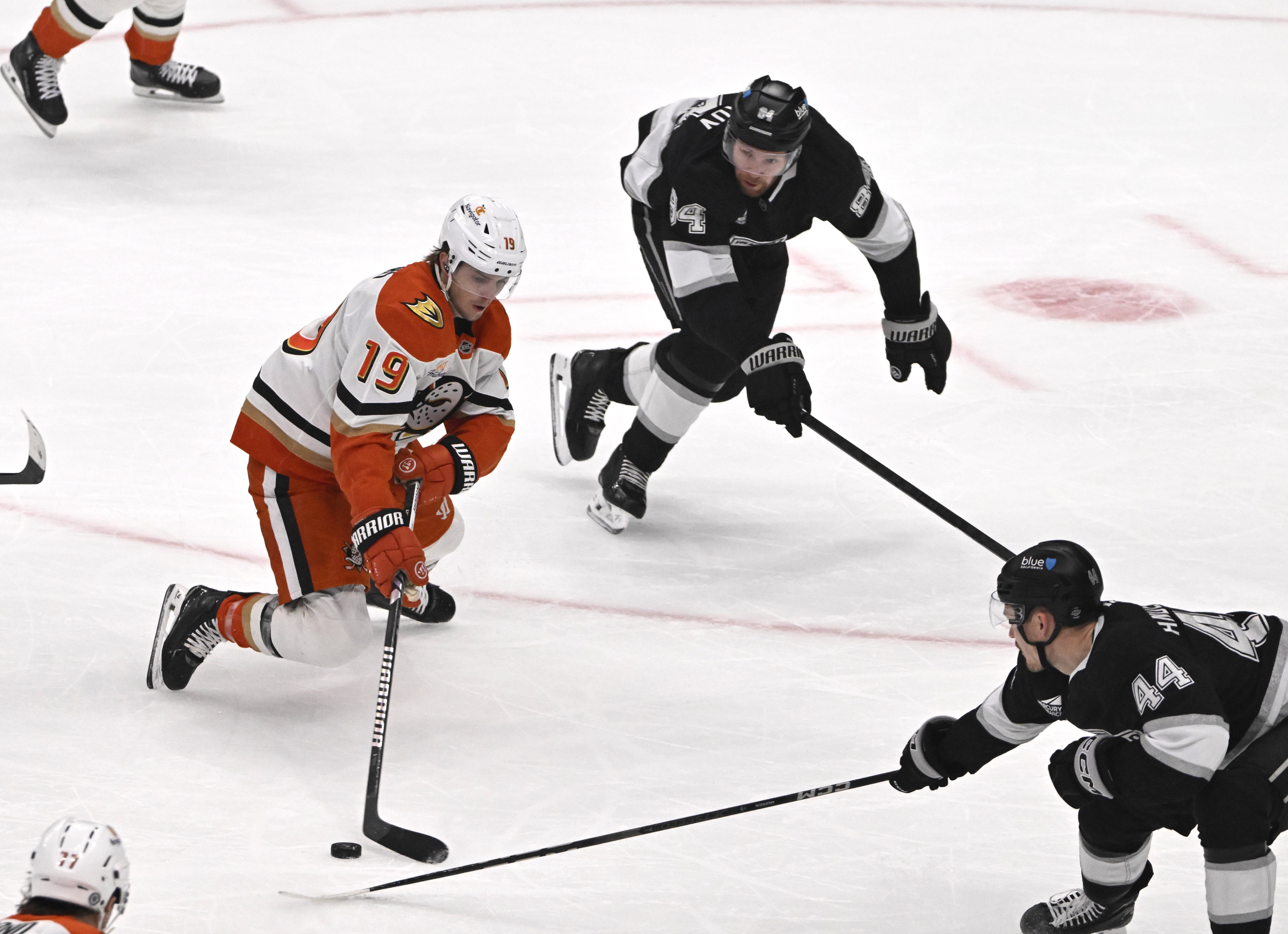 The Ducks’ Troy Terry (19) drives up the ice as...