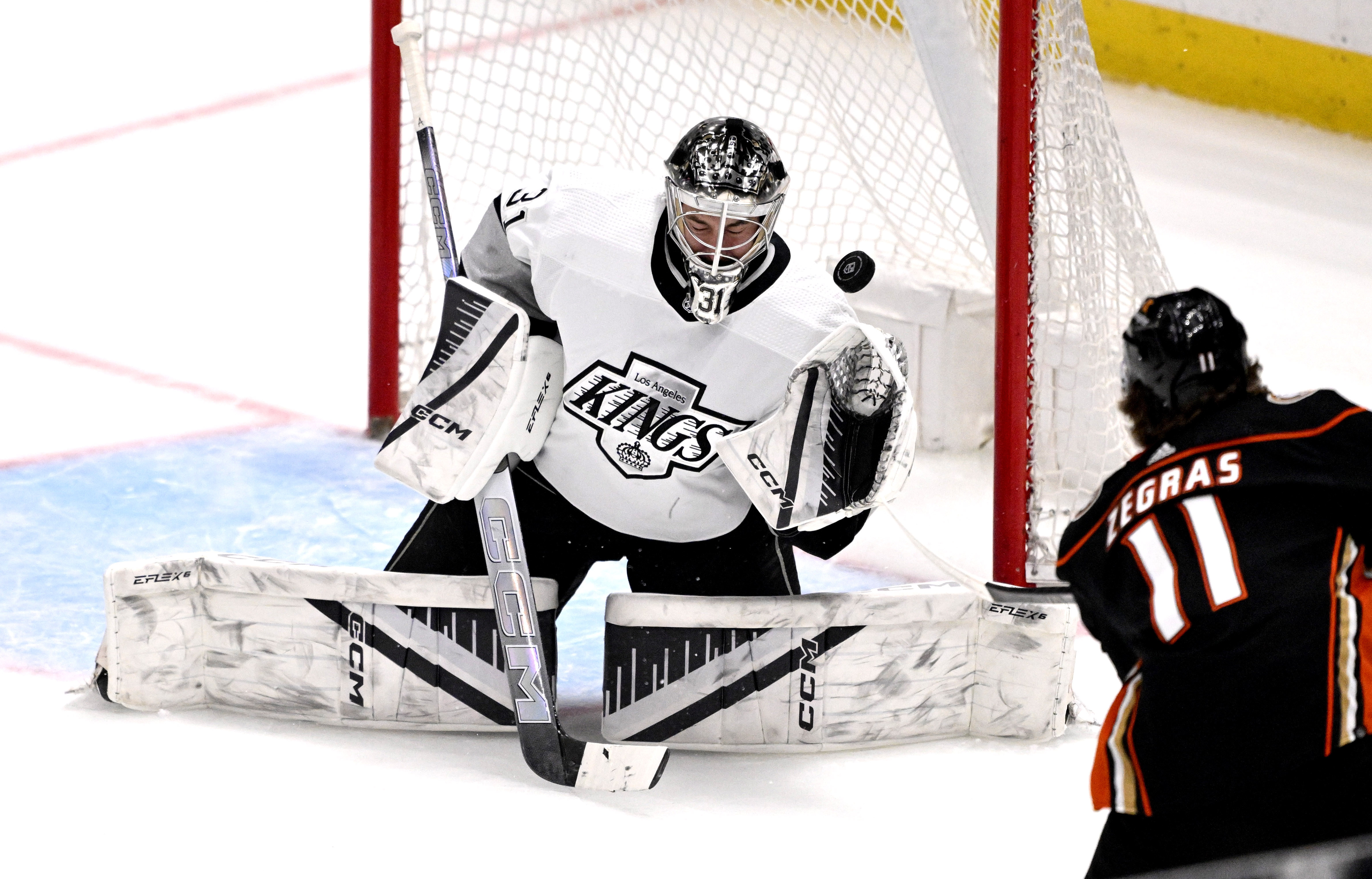 Goalie David Rittich #31 of the Los Angeles Kings blocks...