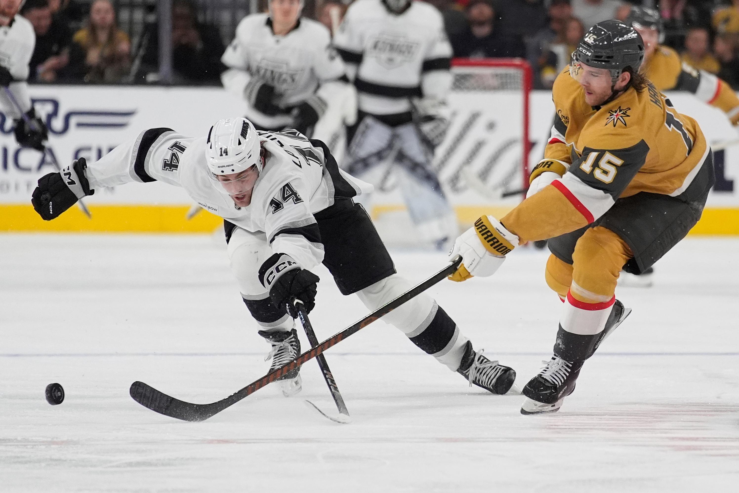 Kings right wing Alex Laferriere (14) and Vegas Golden Knights...