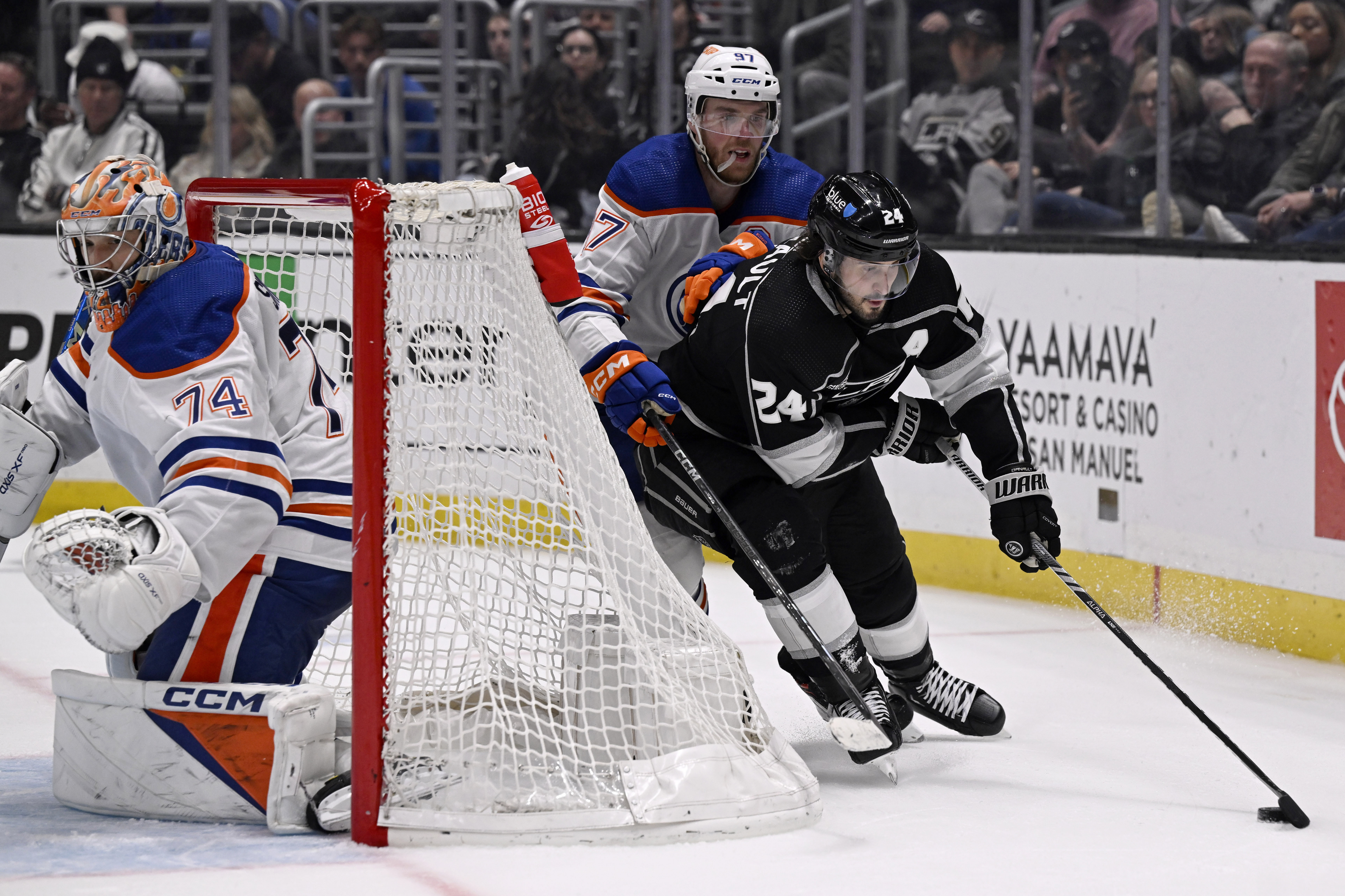 Los Angeles Kings center Phillip Danault (24) controls the puck...