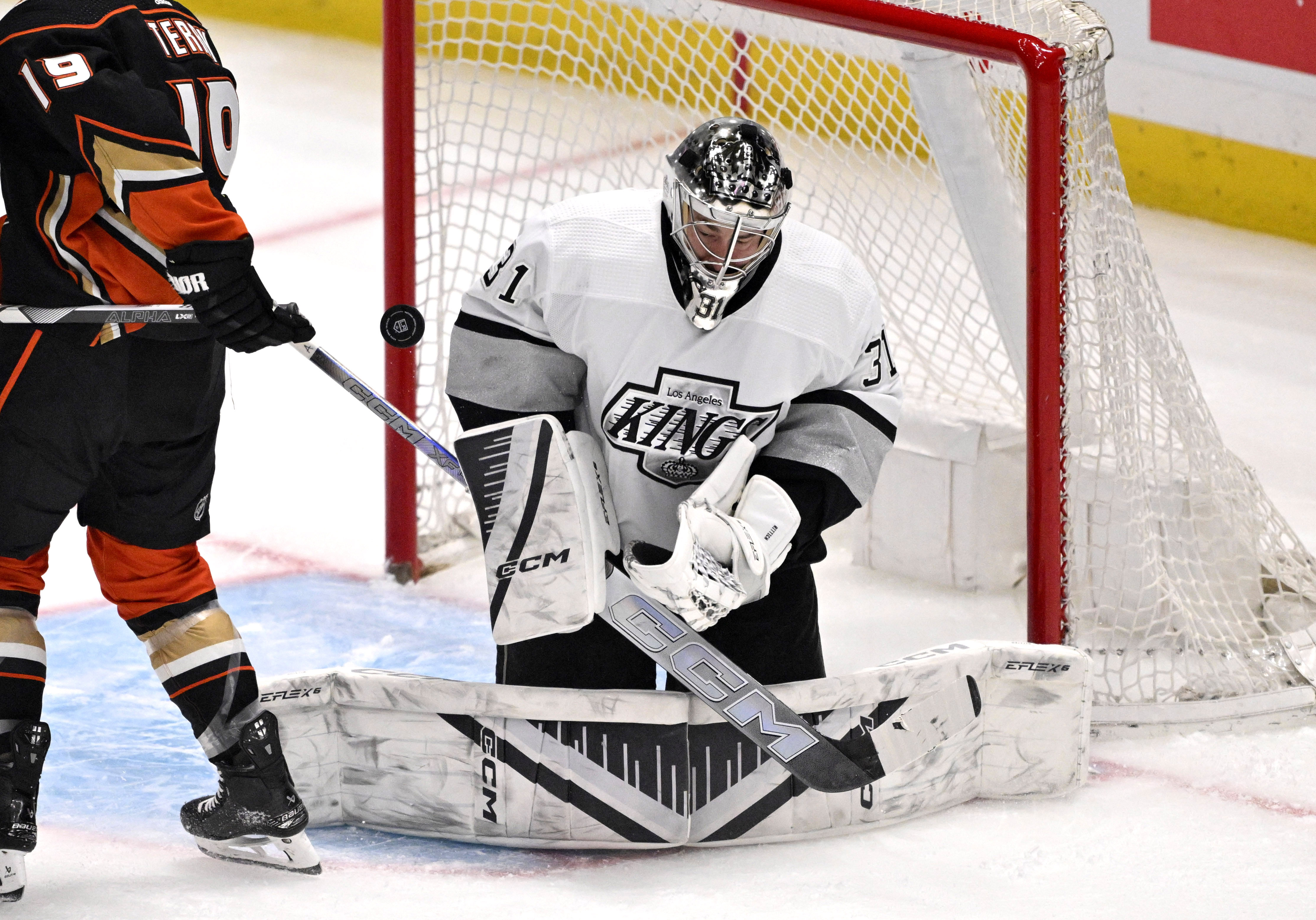 Goalie David Rittich #31 of the Los Angeles Kings blocks...