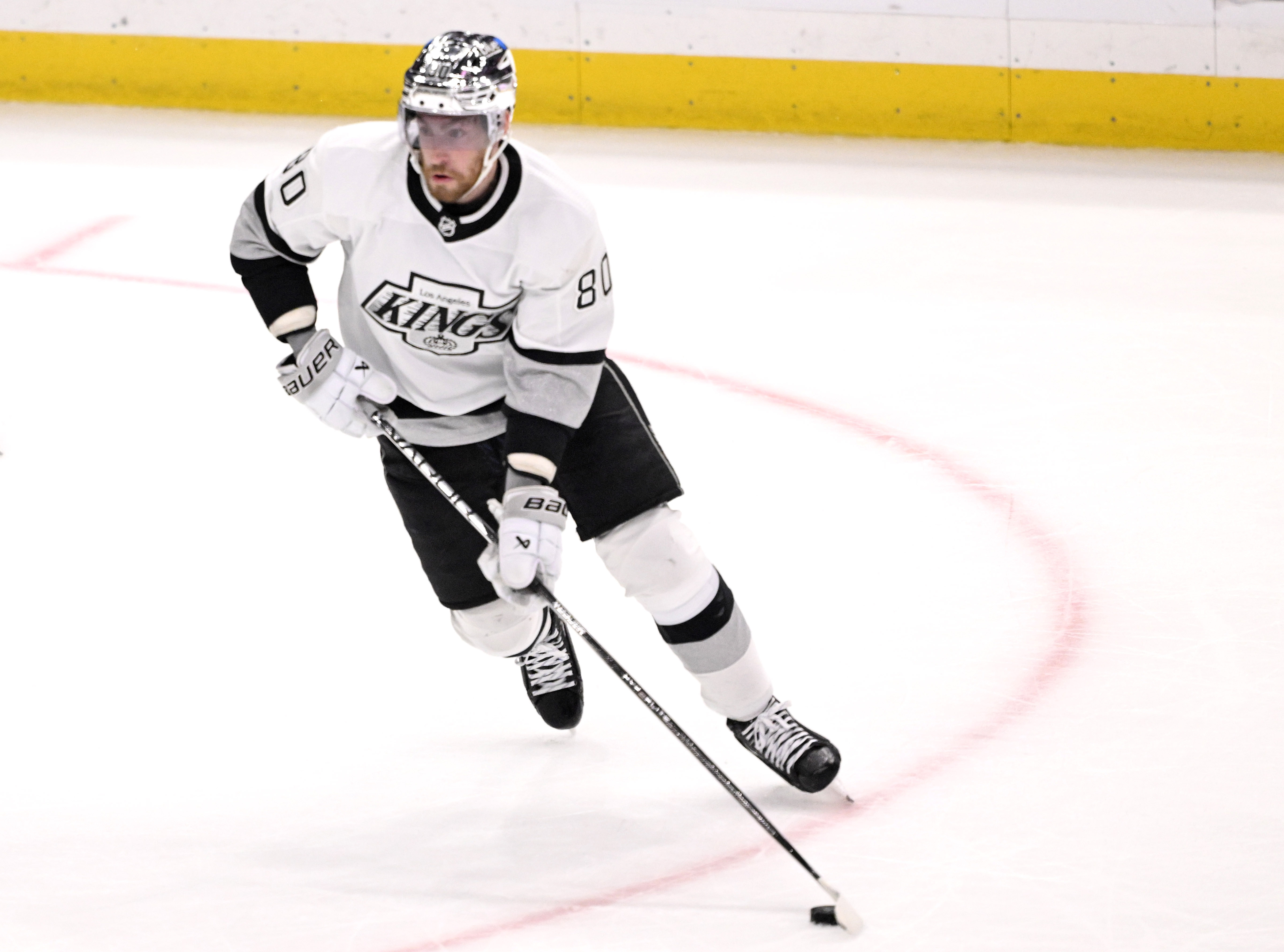 Pierre-Luc Dubois #80 of the Los Angeles Kings control the...