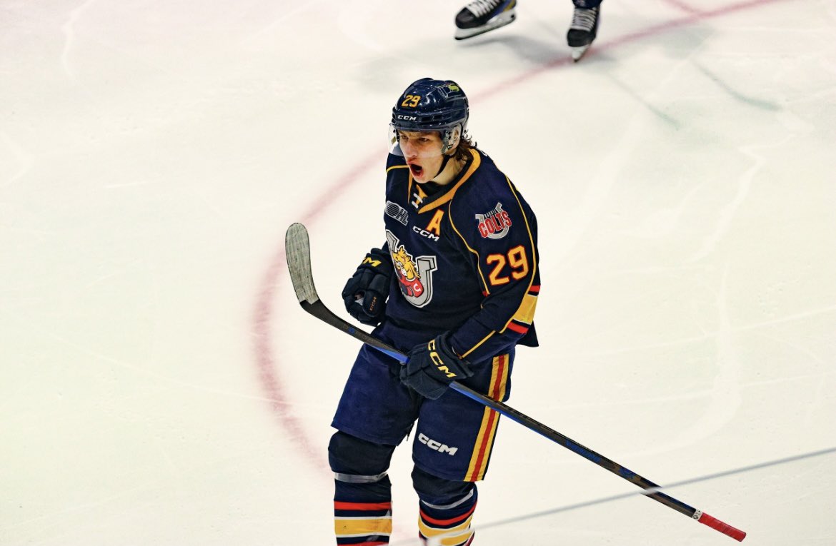 Cole Beaudoin celebrating while wearing a Barrie Colts uniform