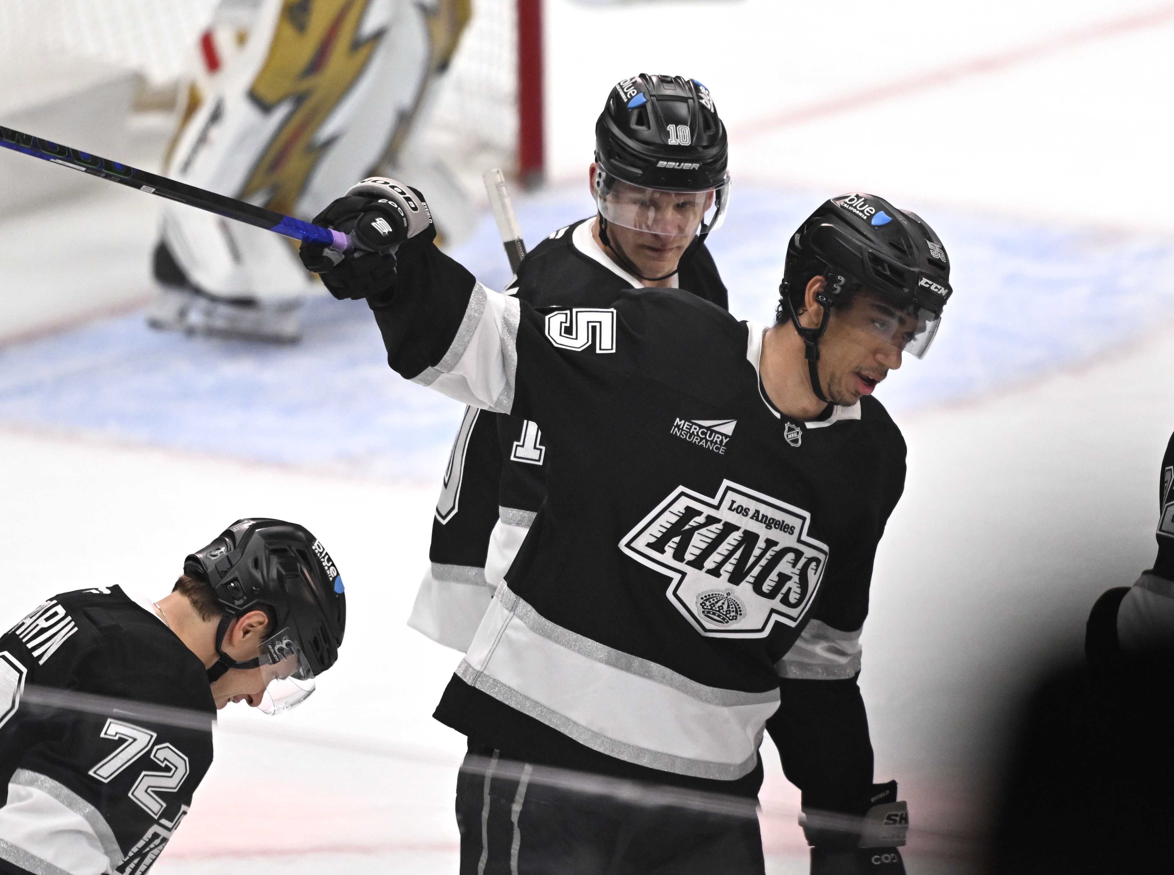 Kings right wing Quinton Byfield (55) celebrates with teammates after...