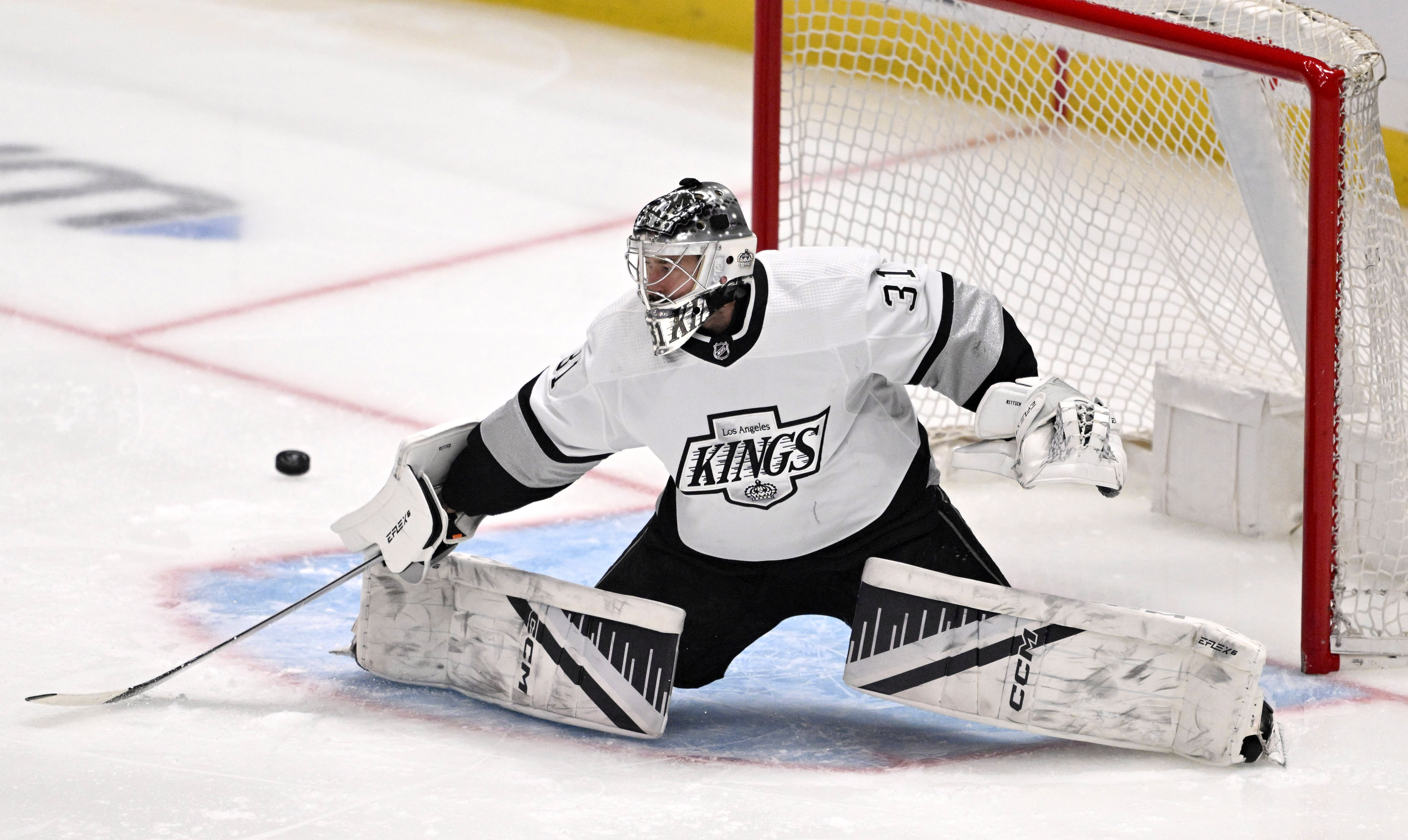 Goalie David Rittich #31 of the Los Angeles Kings blocks...