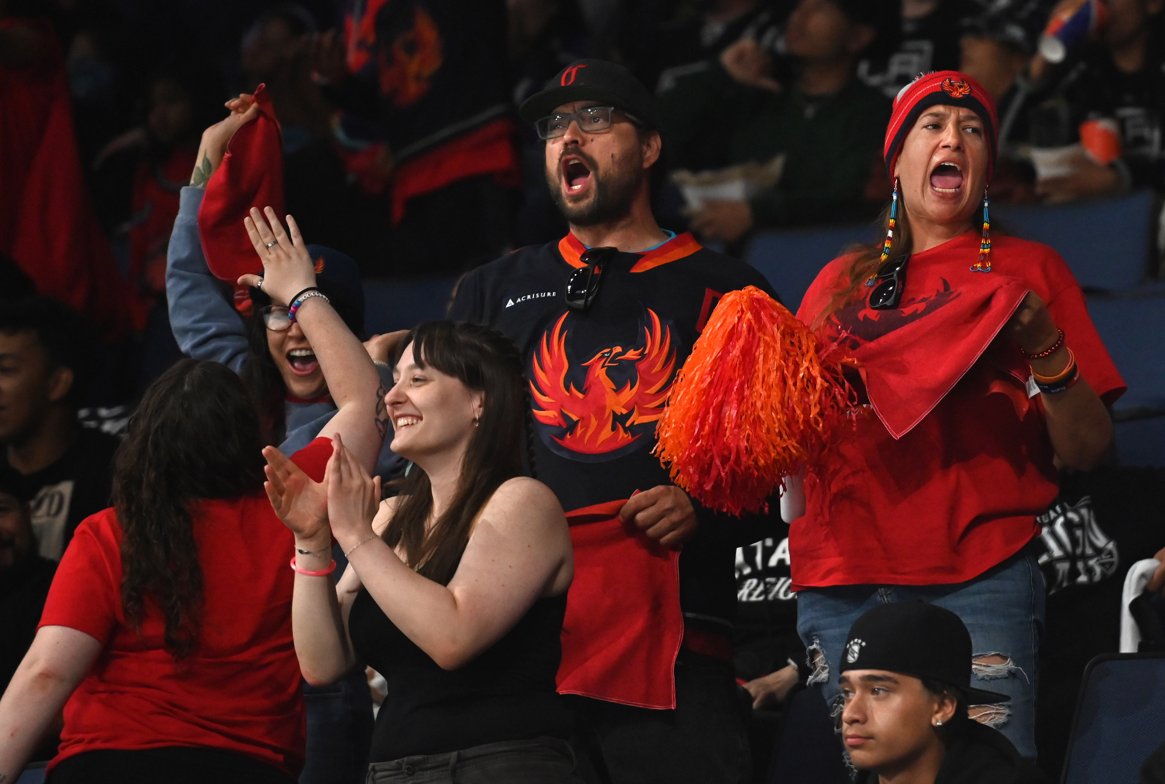 Coachella Valley Firebirds fans celebrate a goal against Ontario Reign...