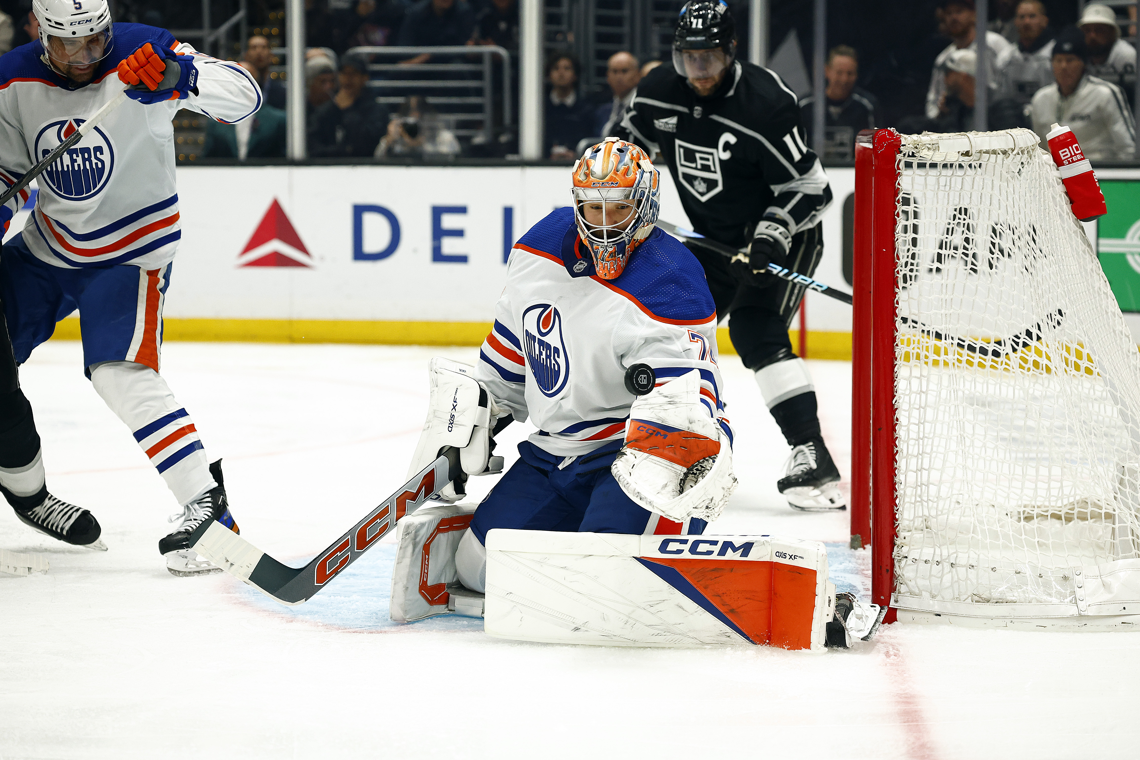 Stuart Skinner #74 of the Edmonton Oilers makes a save...