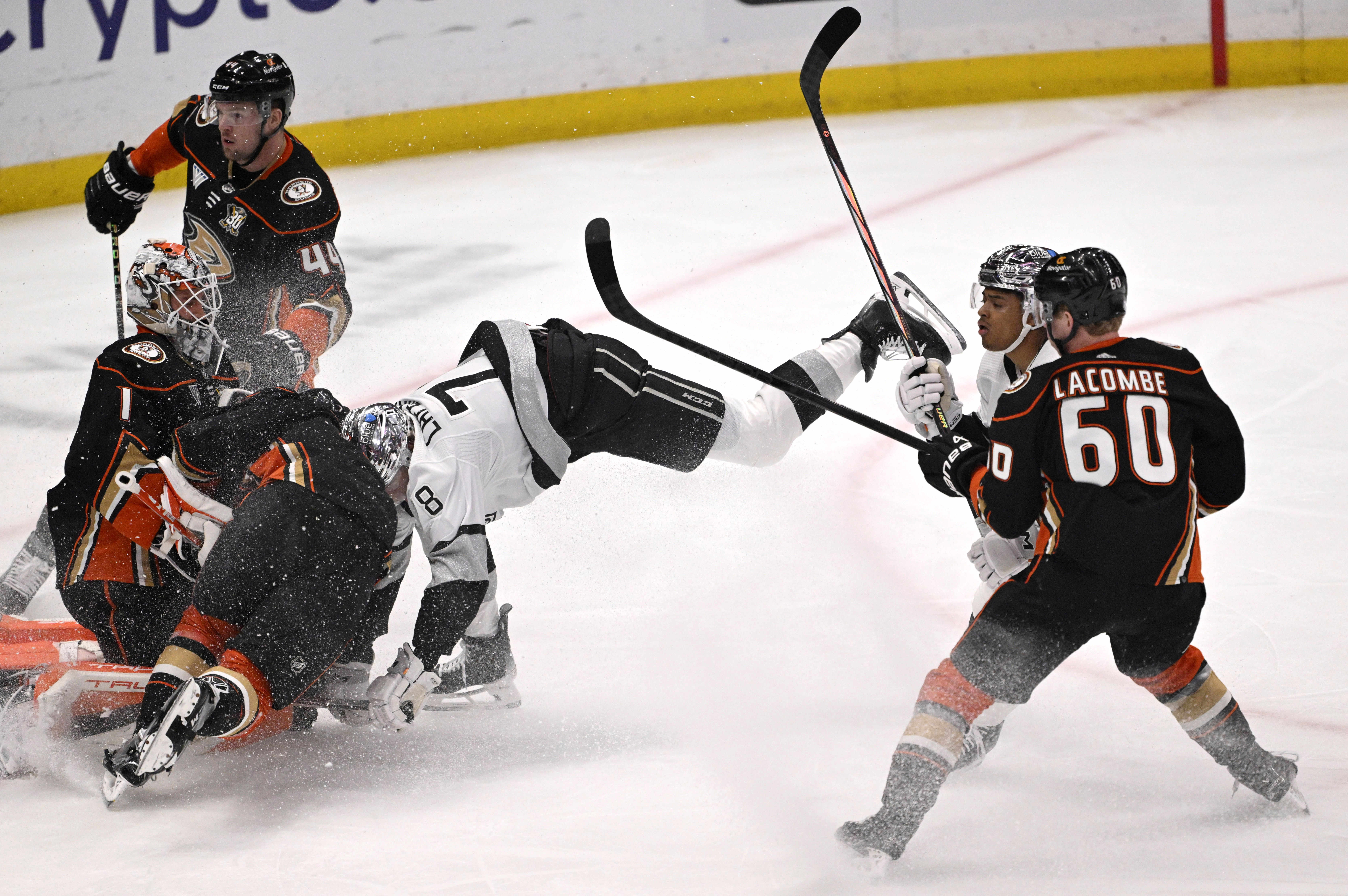 Alex Laferriere #78 of the Los Angeles Kings fights for...