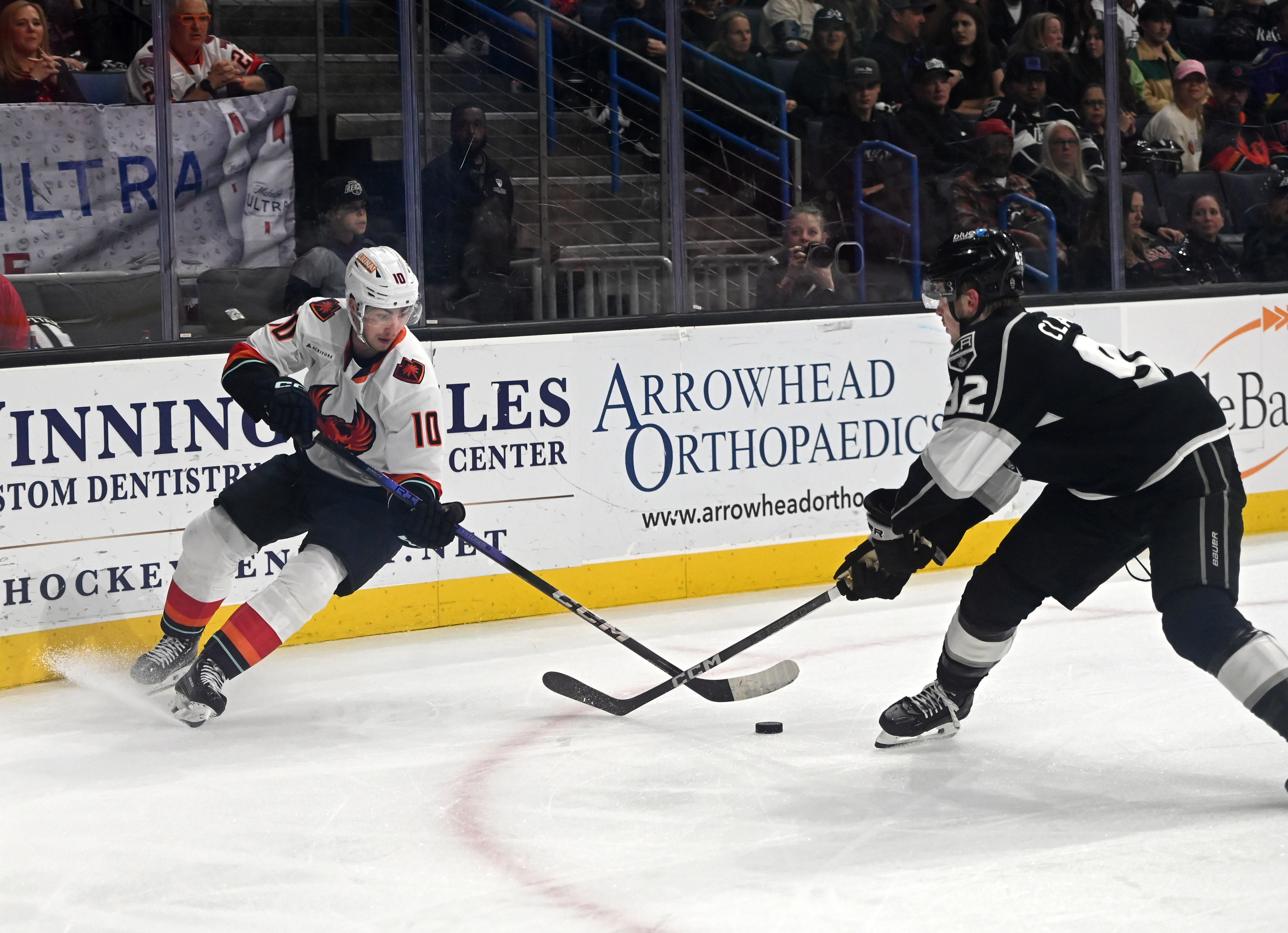 Coachella Valley Firebirds’ Luke Henman and Ontario Reign’s Brandt Clarke...