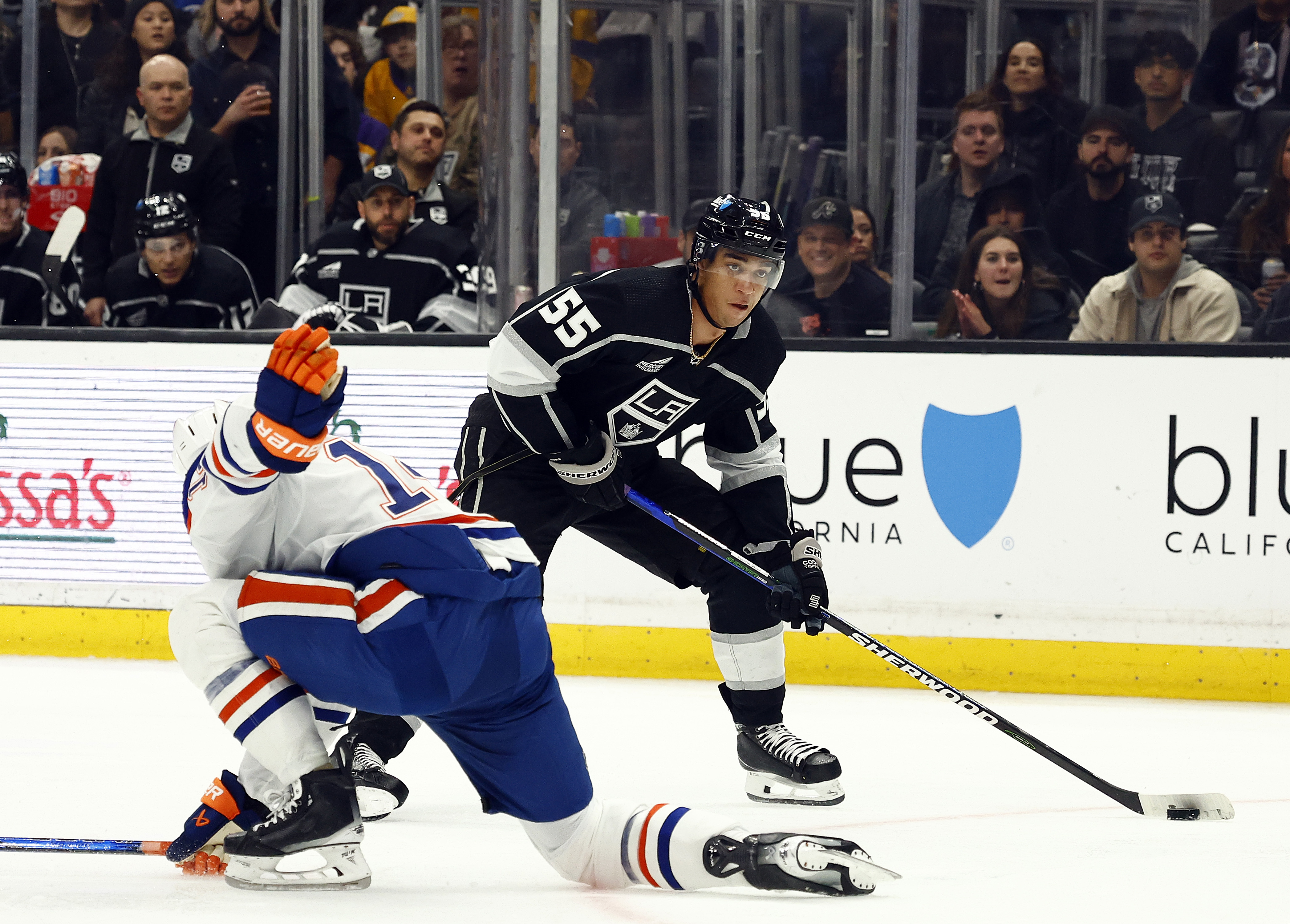 Quinton Byfield #55 of the Los Angeles Kings makes a...