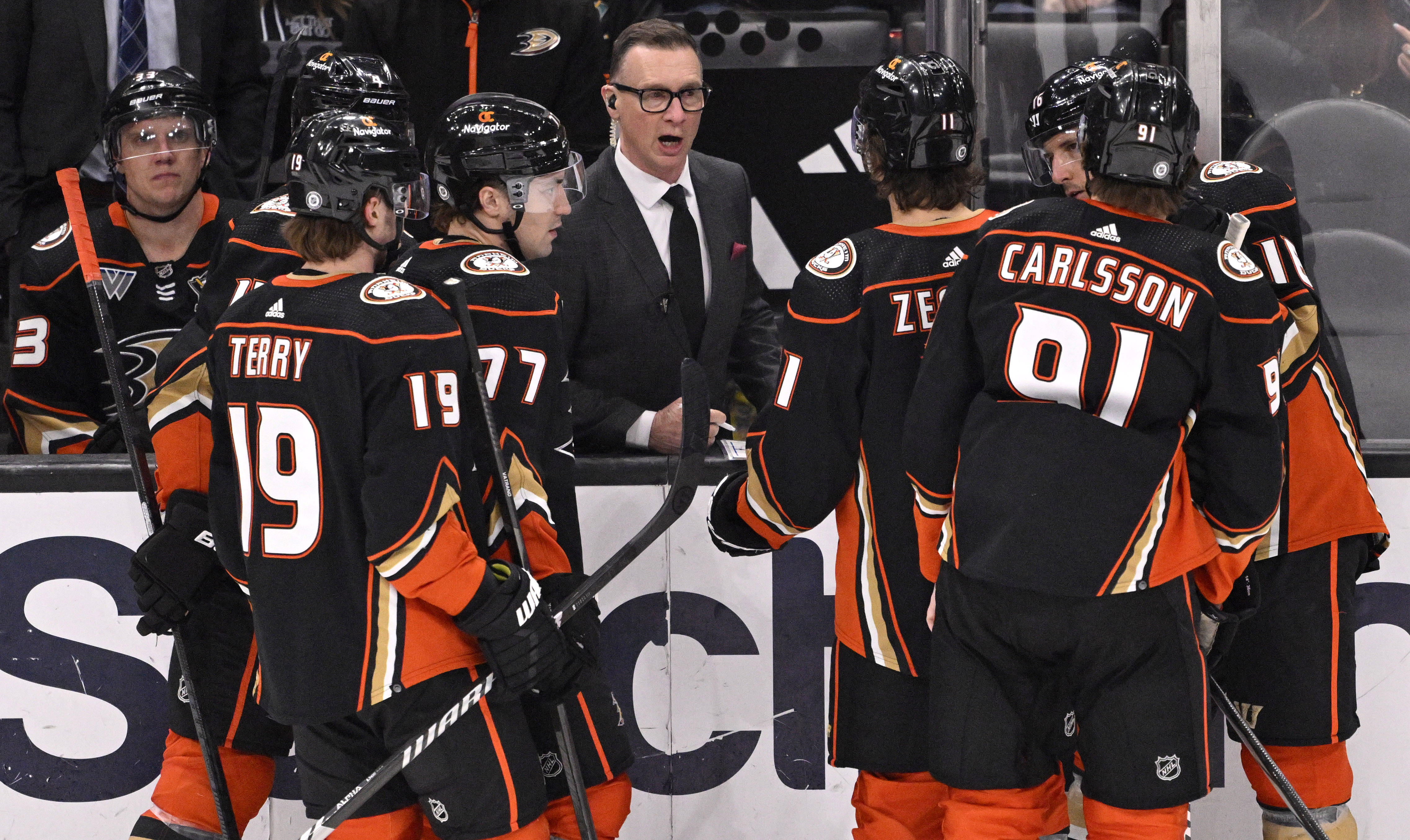 Assistant coach Newell Brown of the Anaheim Ducks talks to...