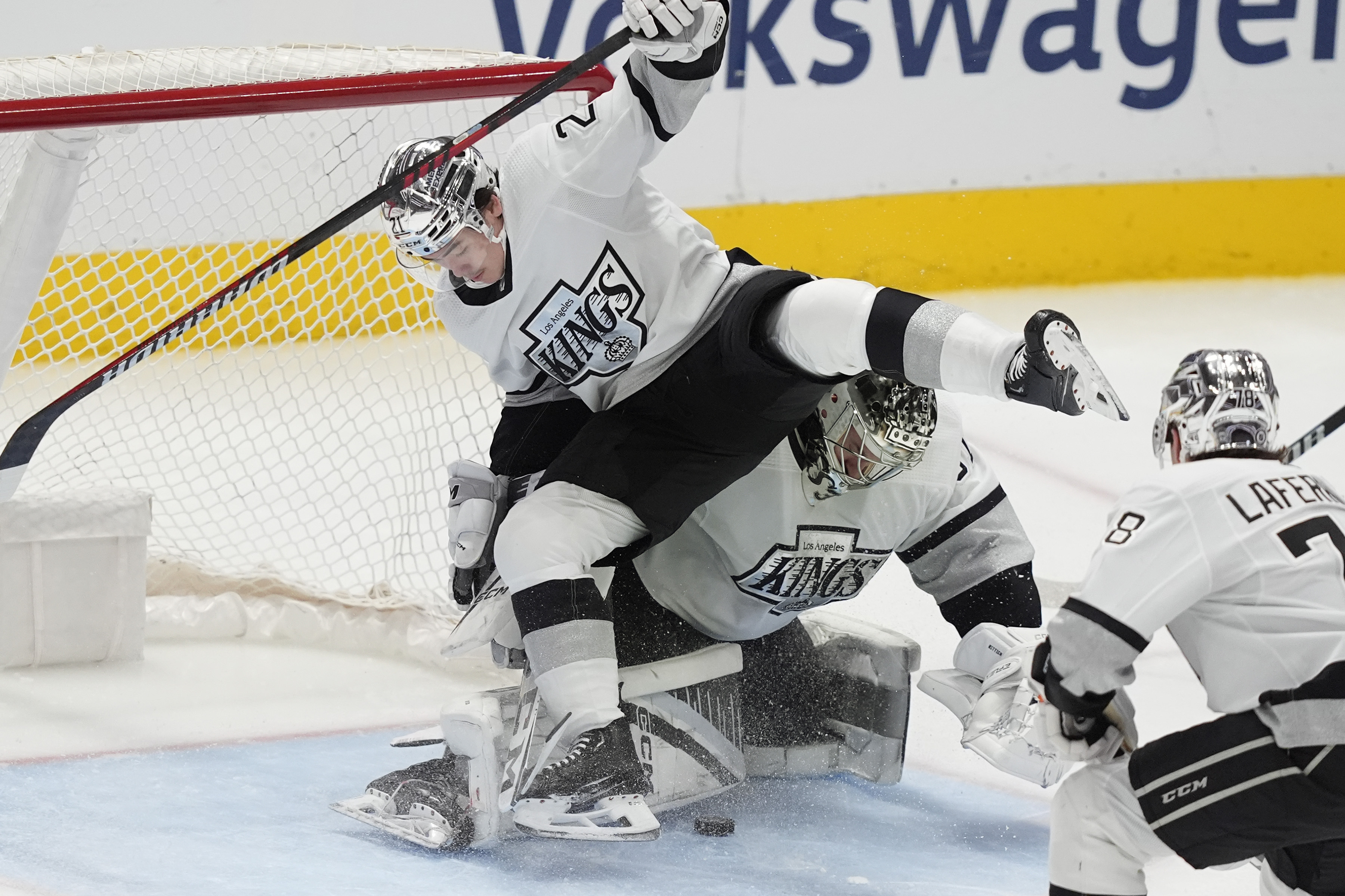 Los Angeles Kings defenseman Jordan Spence comes off his feet...