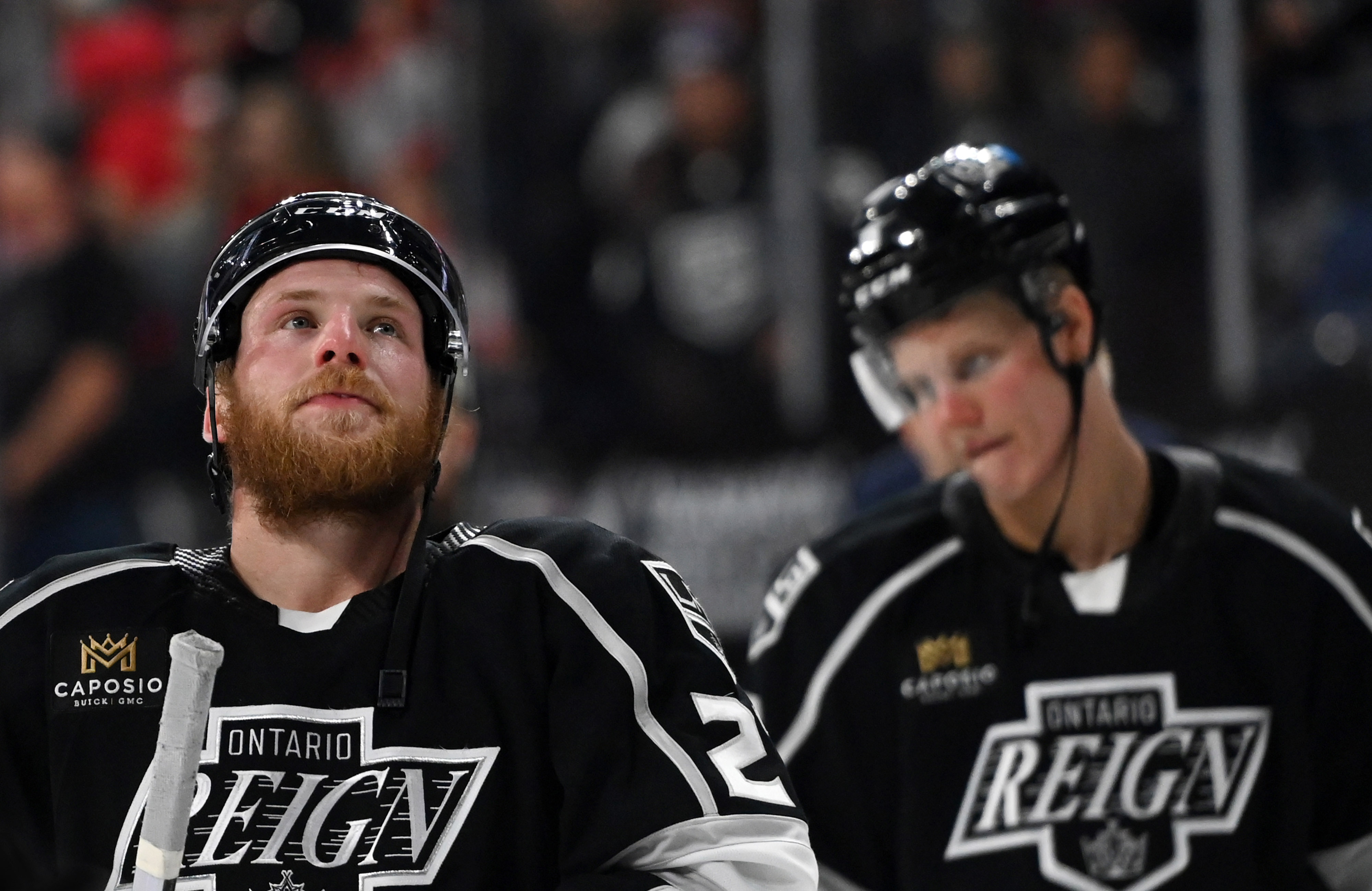 Ontario Reign’s Joe Hicketts and Kim Nousiainen show dejection after...