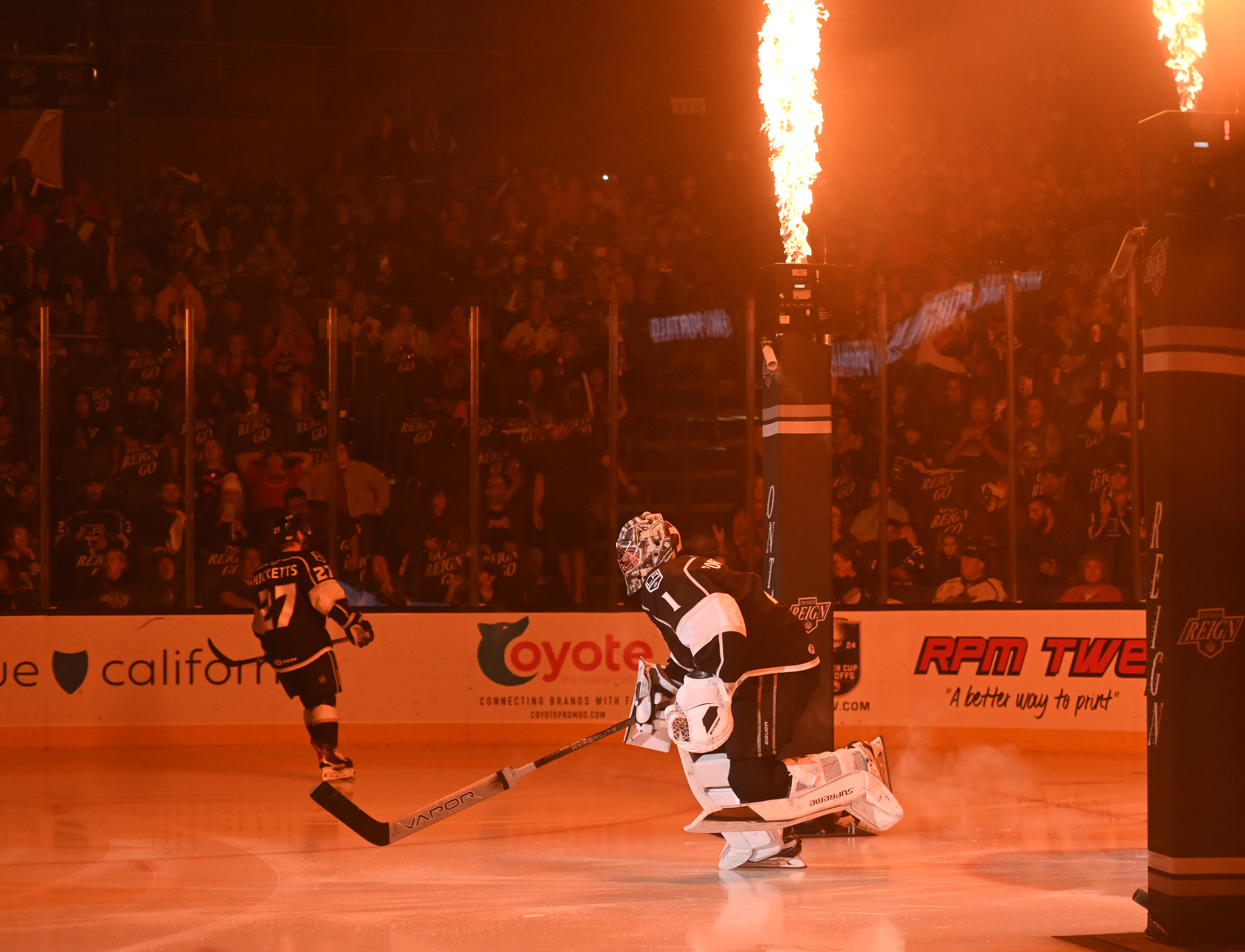 Ontario Reign’s goalie Erik Portillo enters the ice arena before...