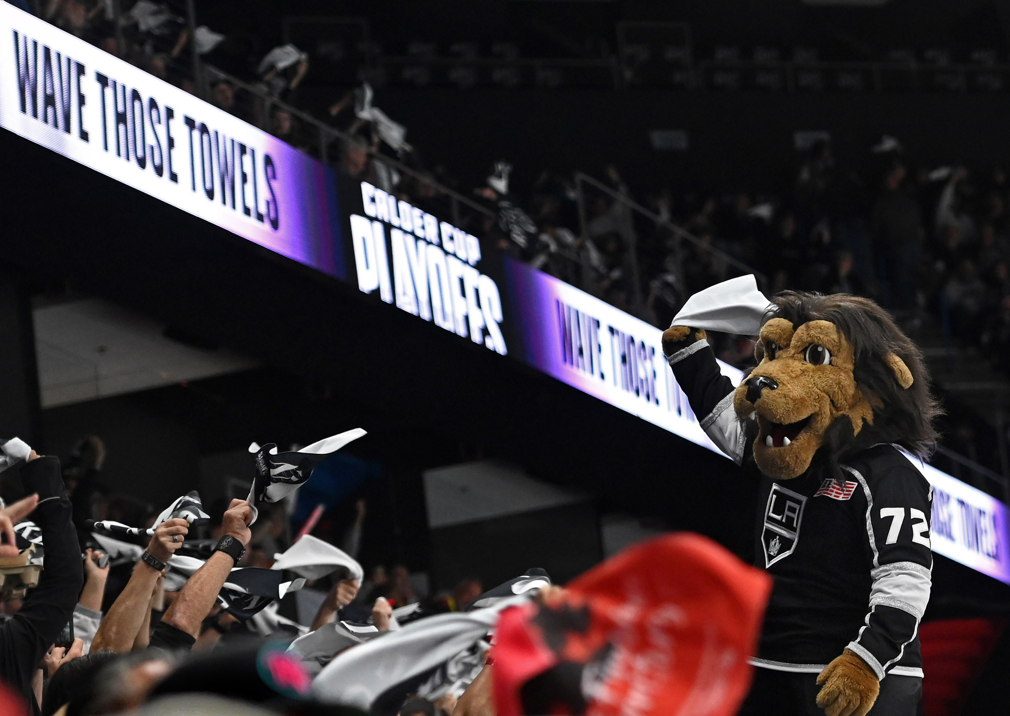 LA Kings mascot, Bailey, waves a towel during Game 3...