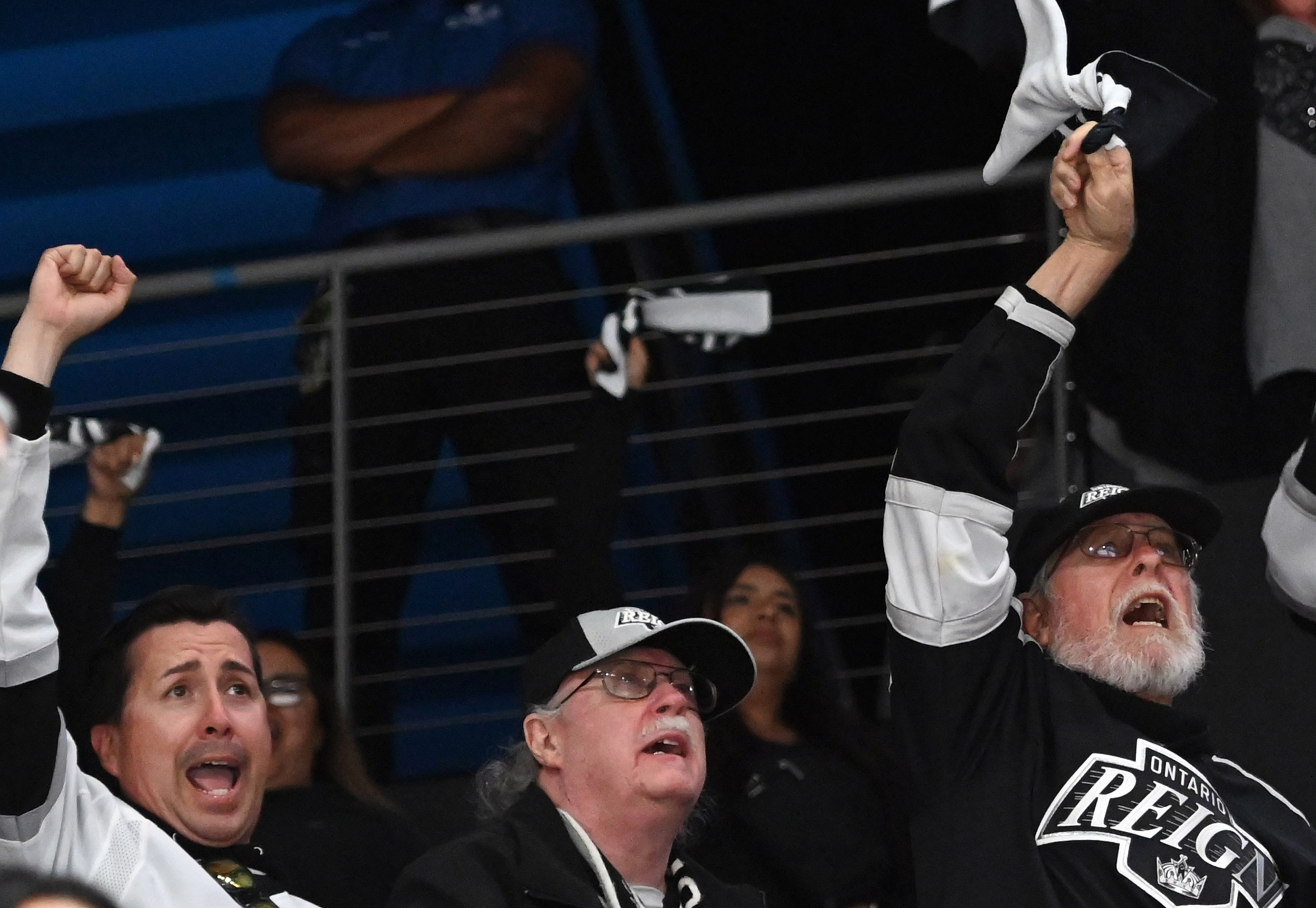 Ontario Reign fsans react after a goal against Coachella Valley...