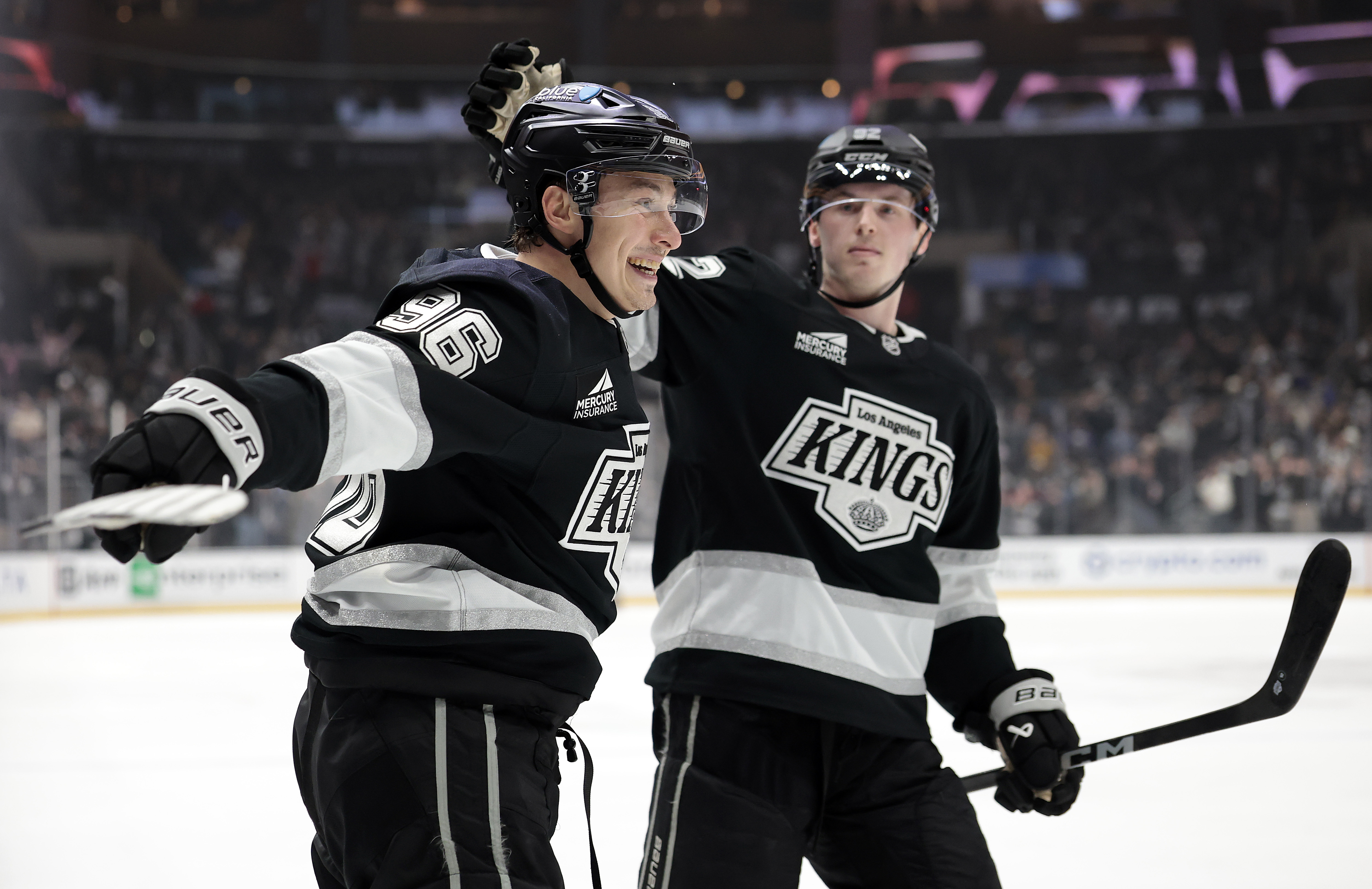 Andrei Kuzmenko, left, celebrates a goal with Brandt Clarke during...