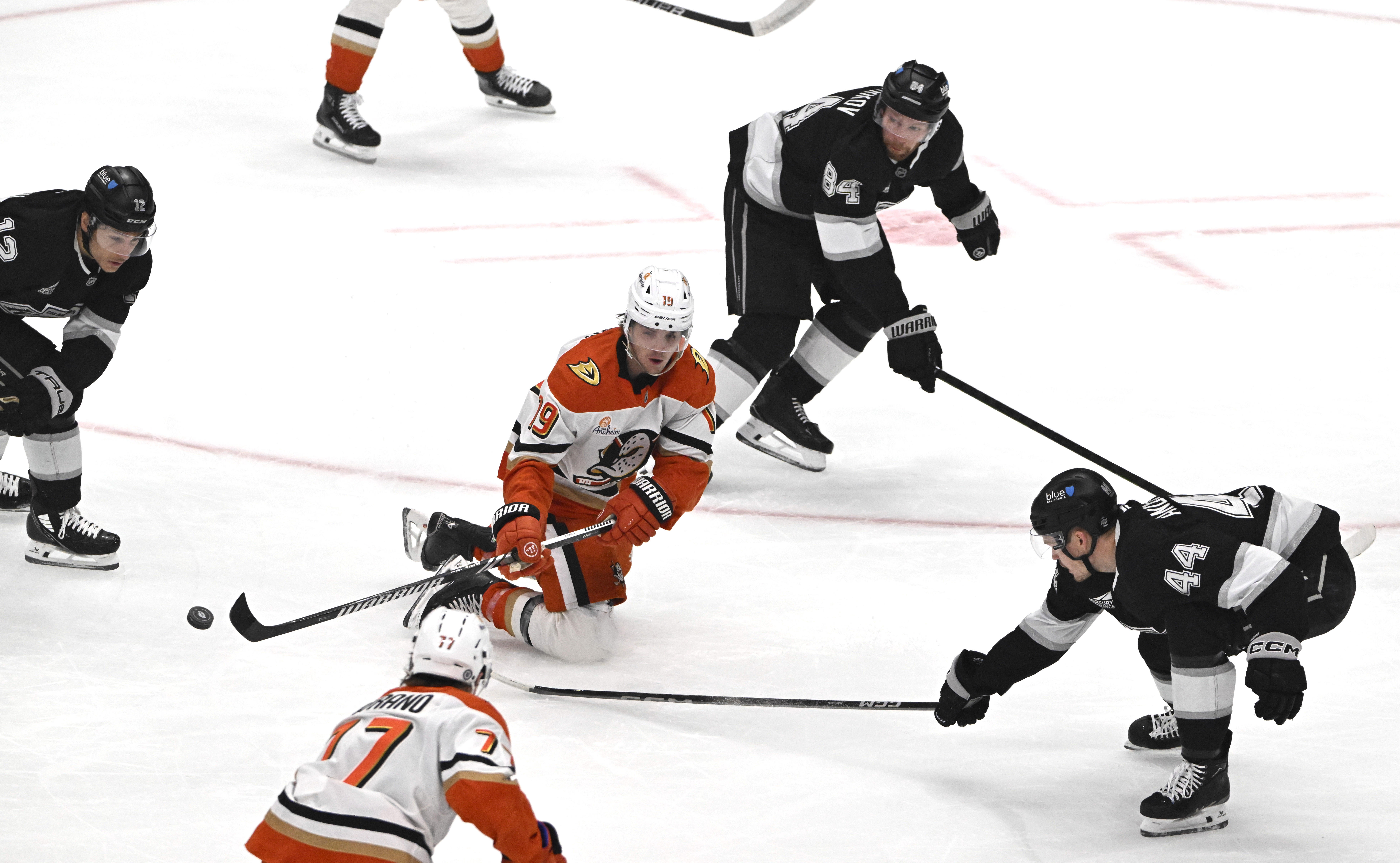 The Ducks’ Troy Terry (19) passes the puck as he...