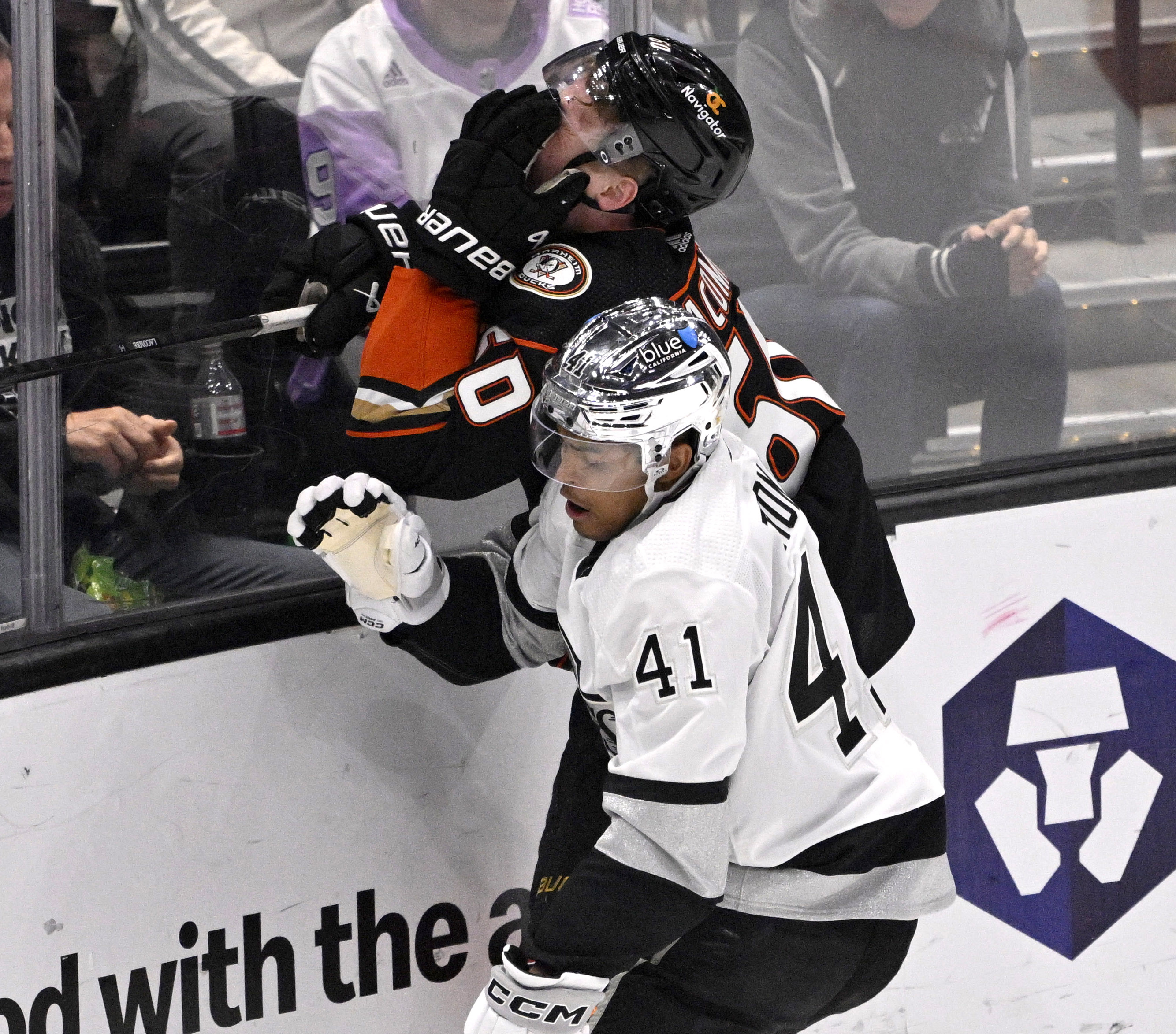 Jackson LaCombe #60 of the Anaheim Ducks takes a high...