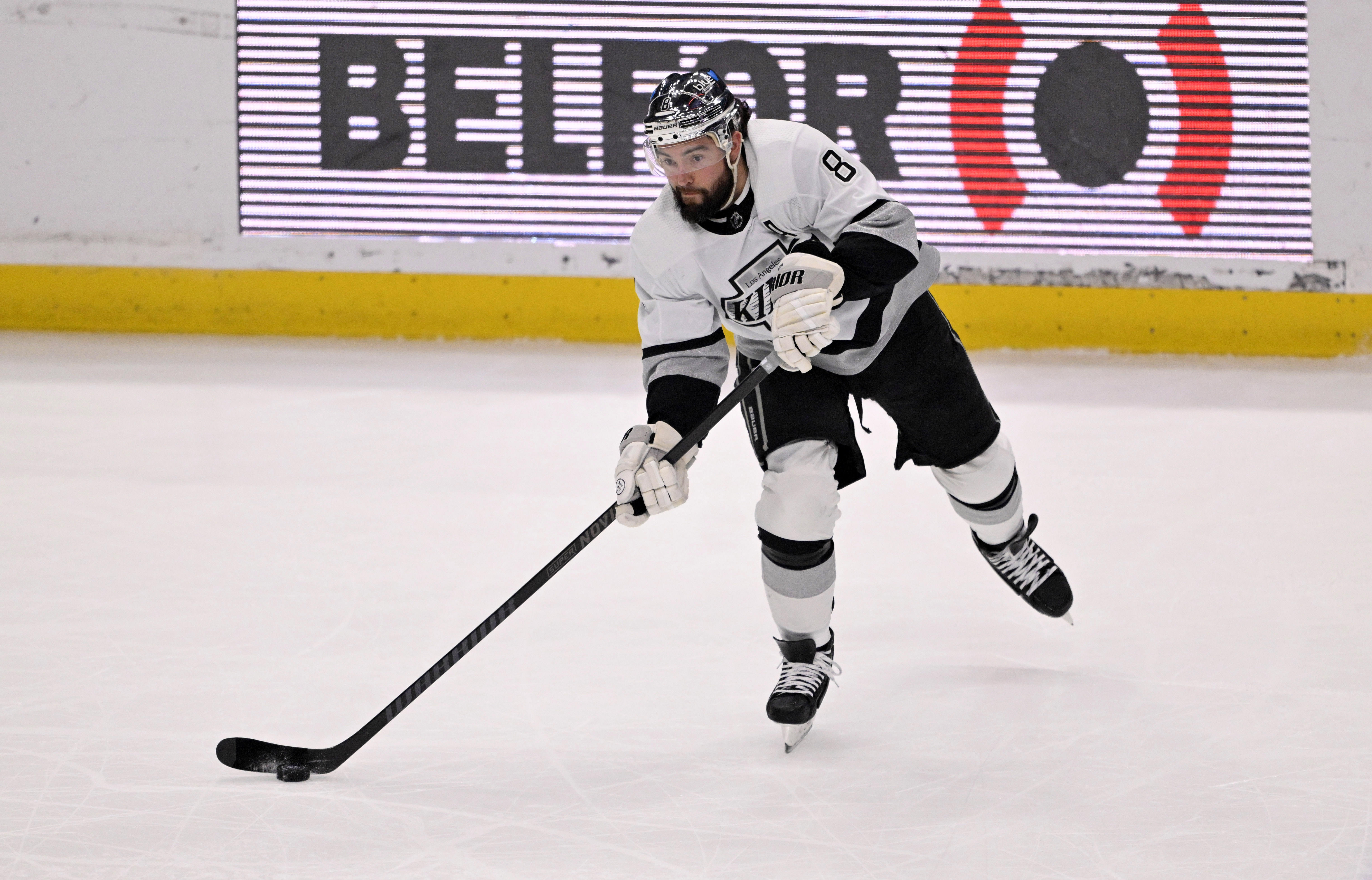 Drew Doughty #8 of the Los Angeles Kings controls the...