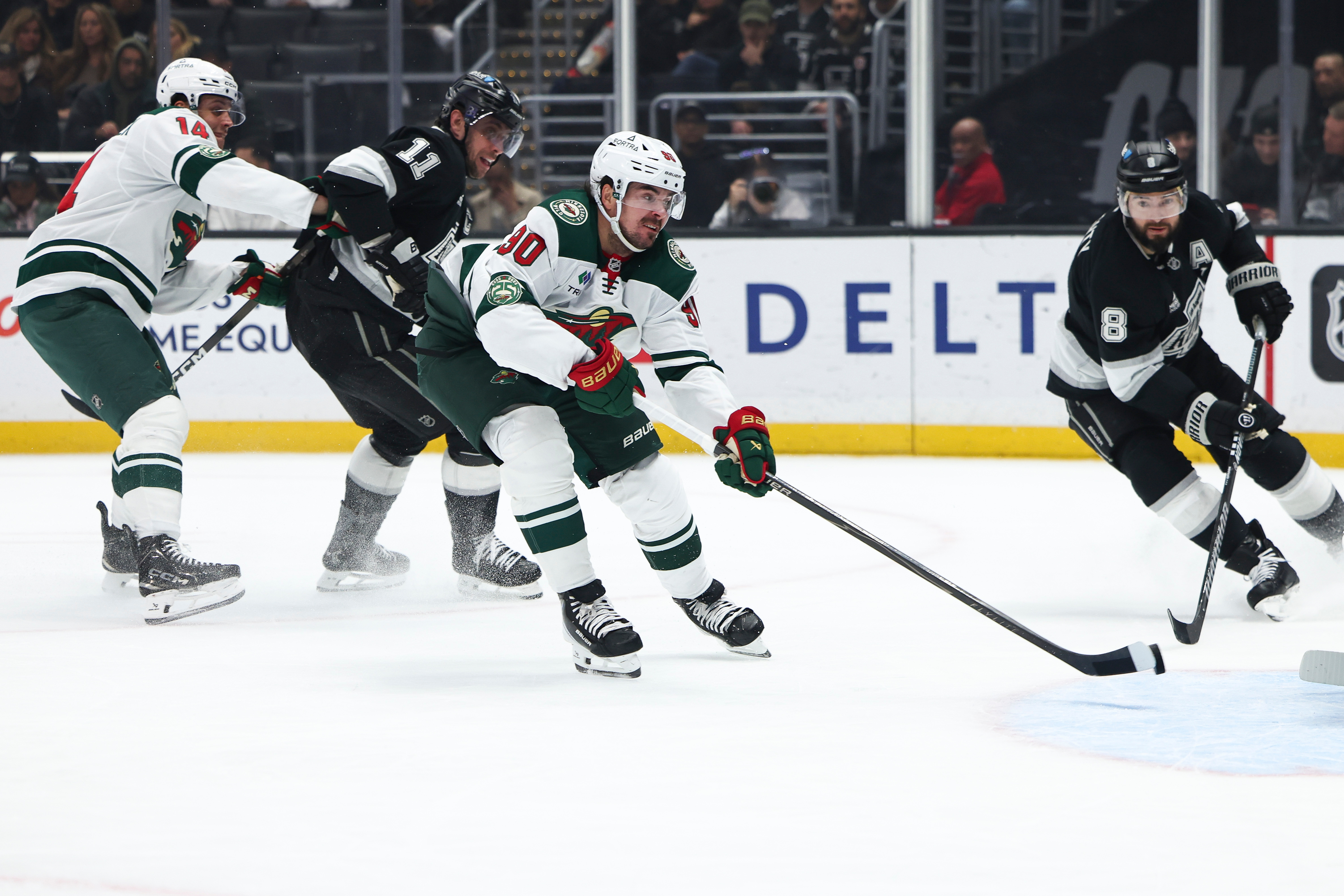 Minnesota Wild left wing Marcus Johansson (90) shoots as Wild...