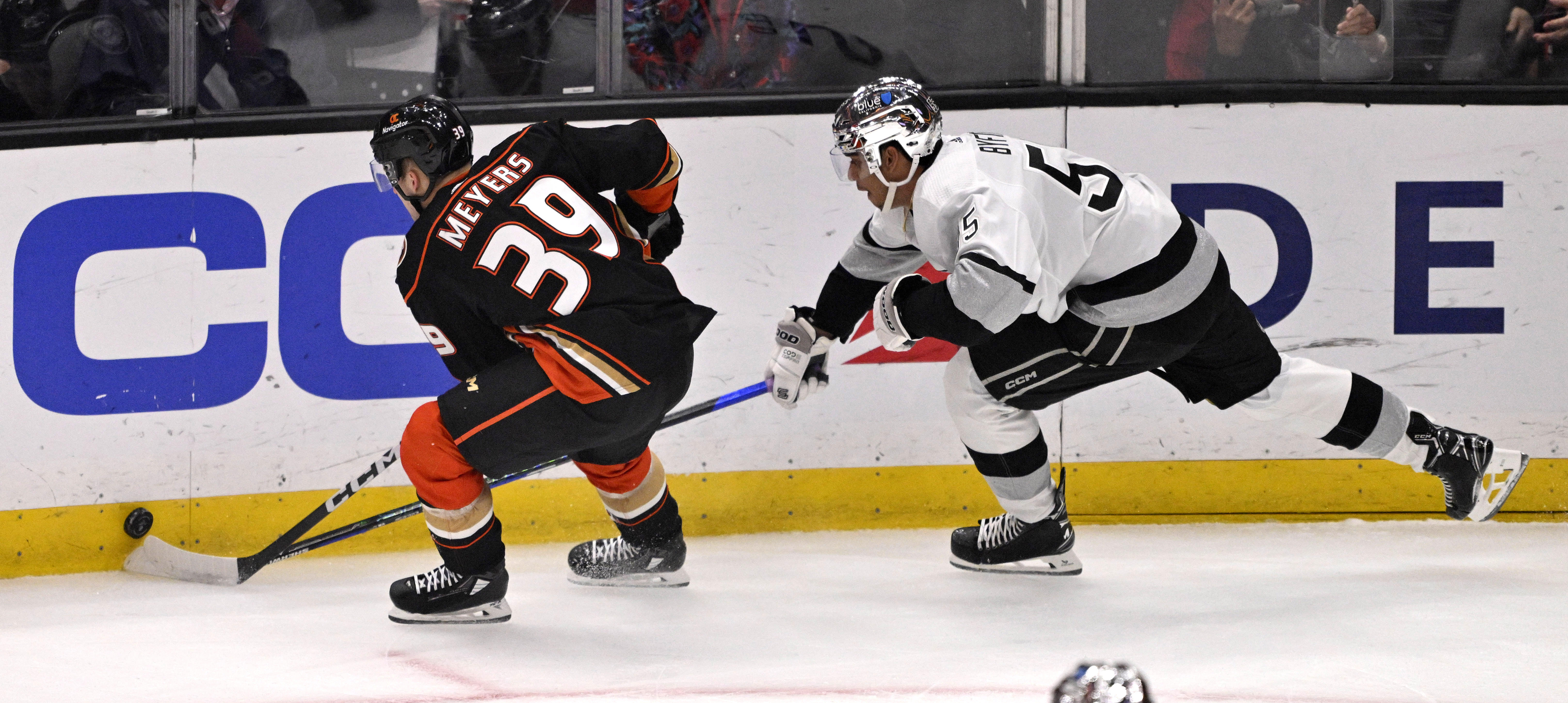 Ben Meyers #39 of the Anaheim Ducks fights for the...