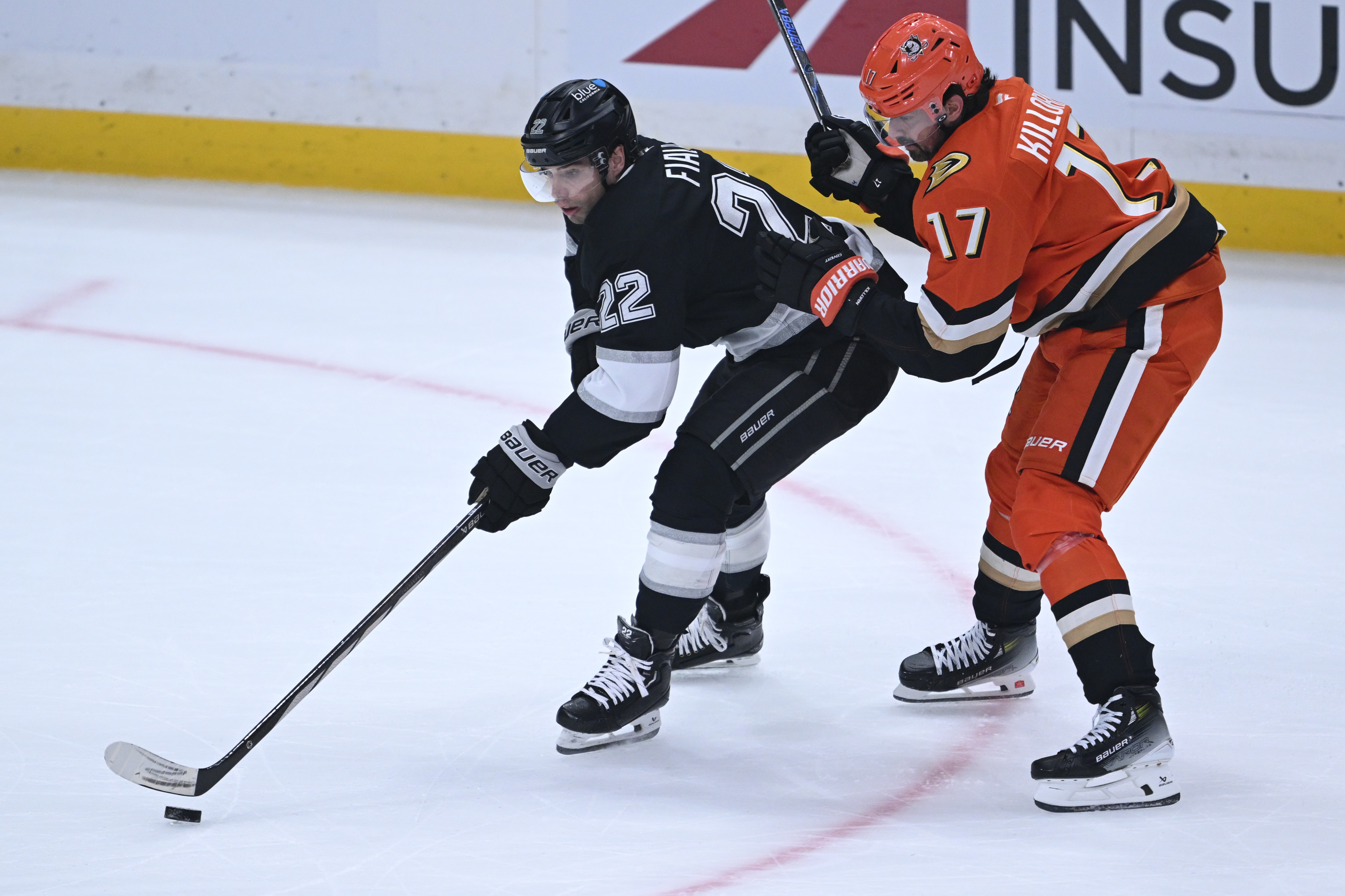 The Ducks’ Alex Killorn, right, got a penalty for holding...