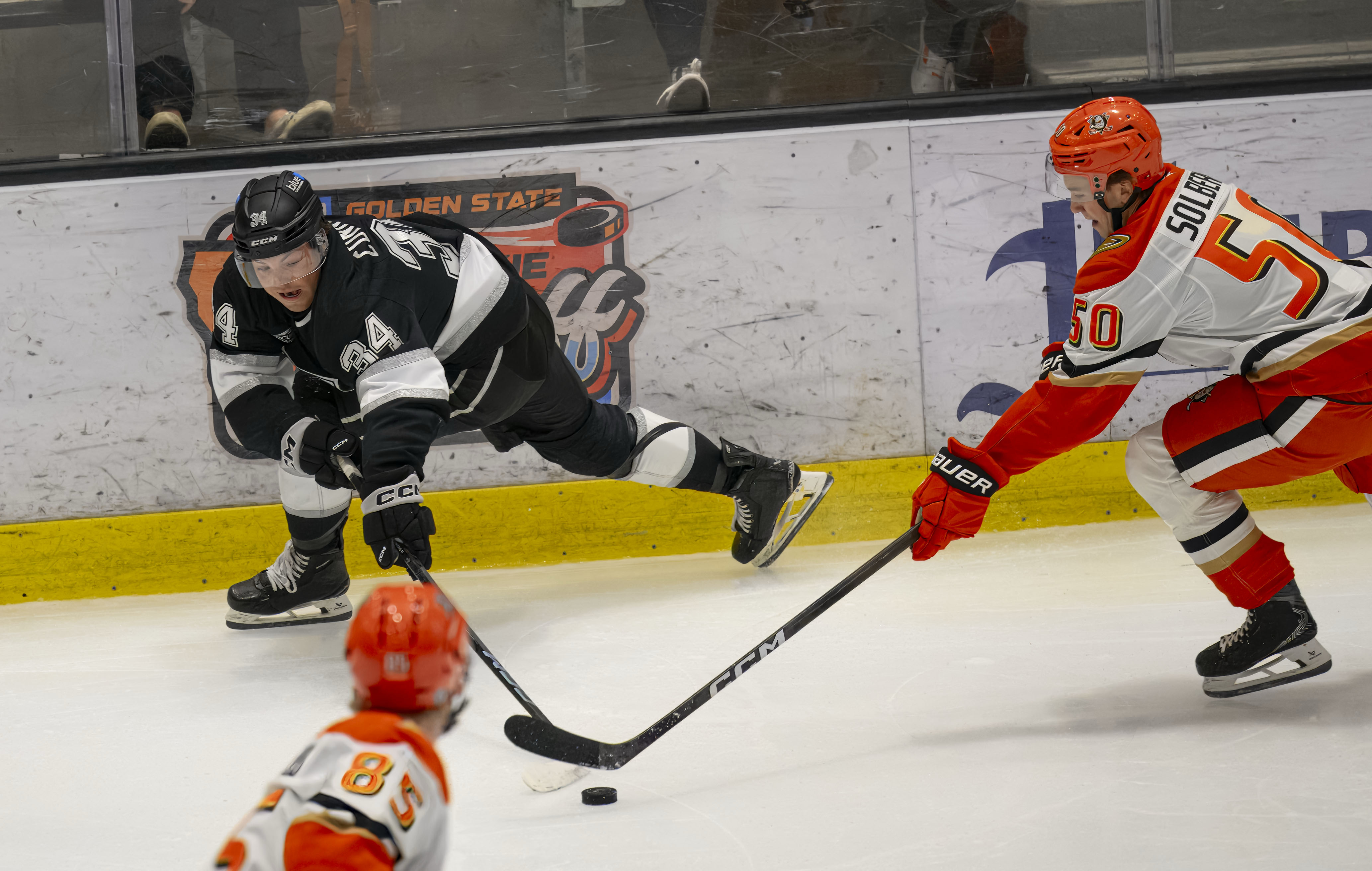 The Kings’ Kenny Connors, left, and the Ducks’ Stian Solberg...