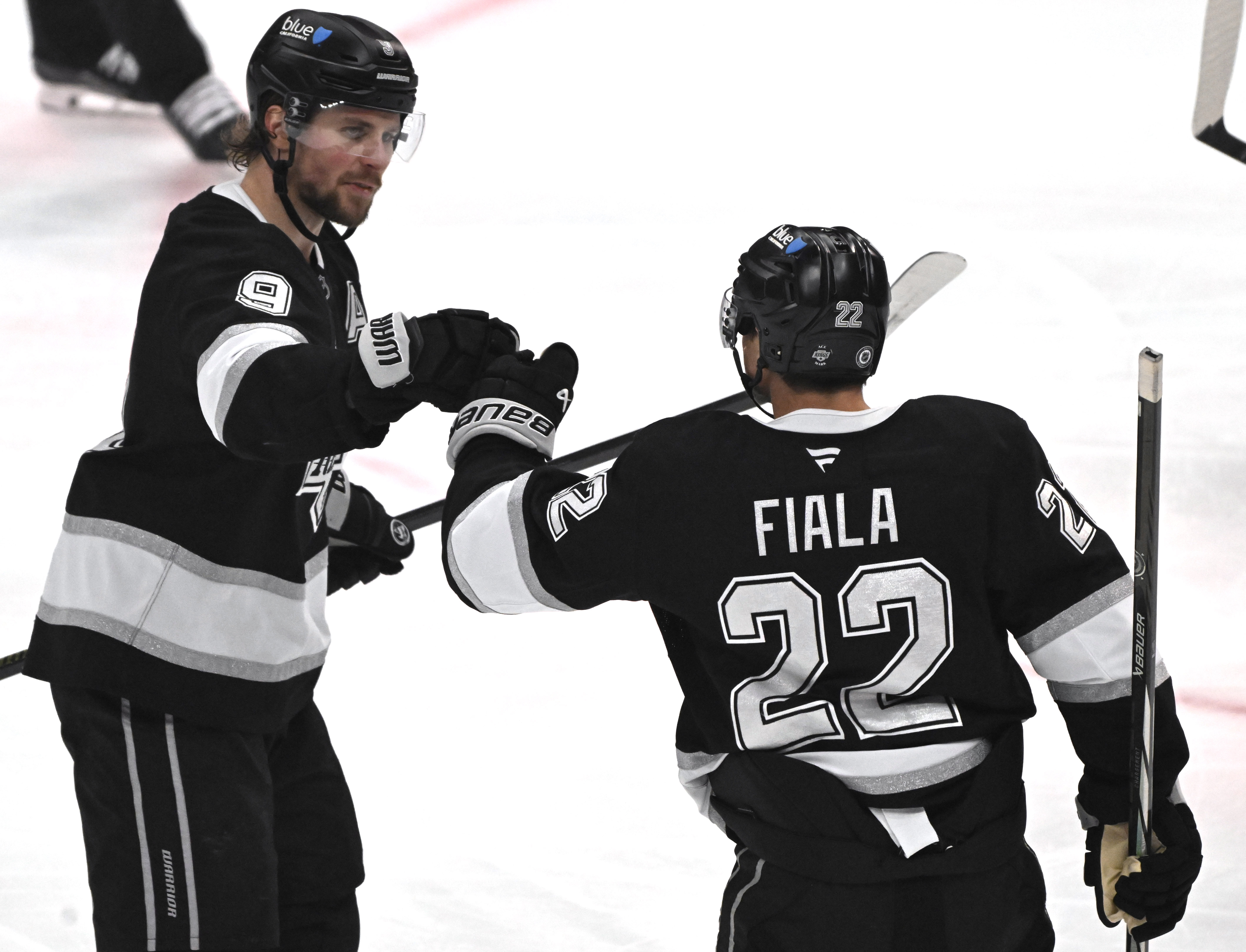 The Kings’ Kevin Fiala, right, celebrates with teammate Adrian Kempe...