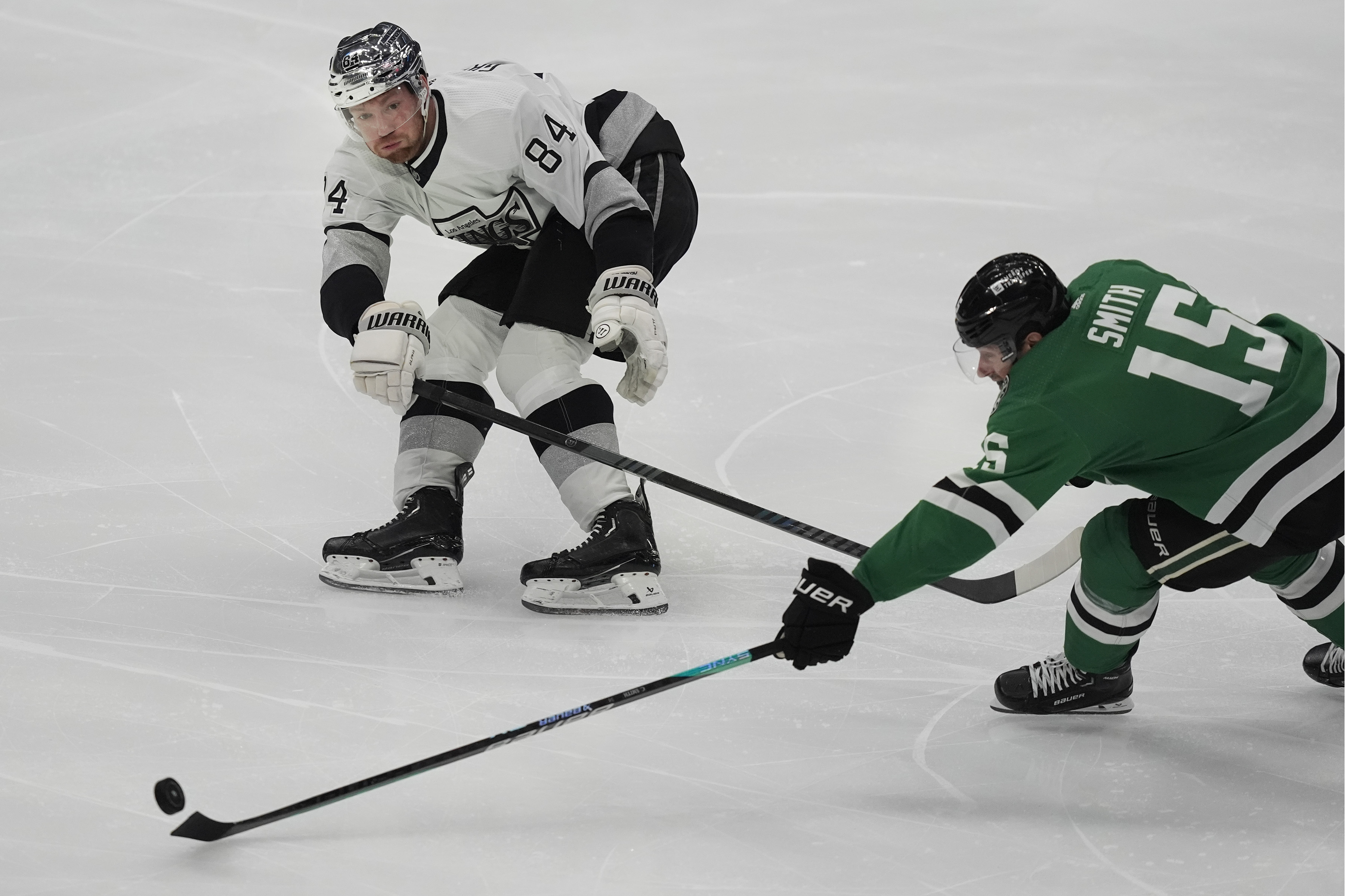 Dallas Stars center Craig Smith (15) and Los Angeles Kings...
