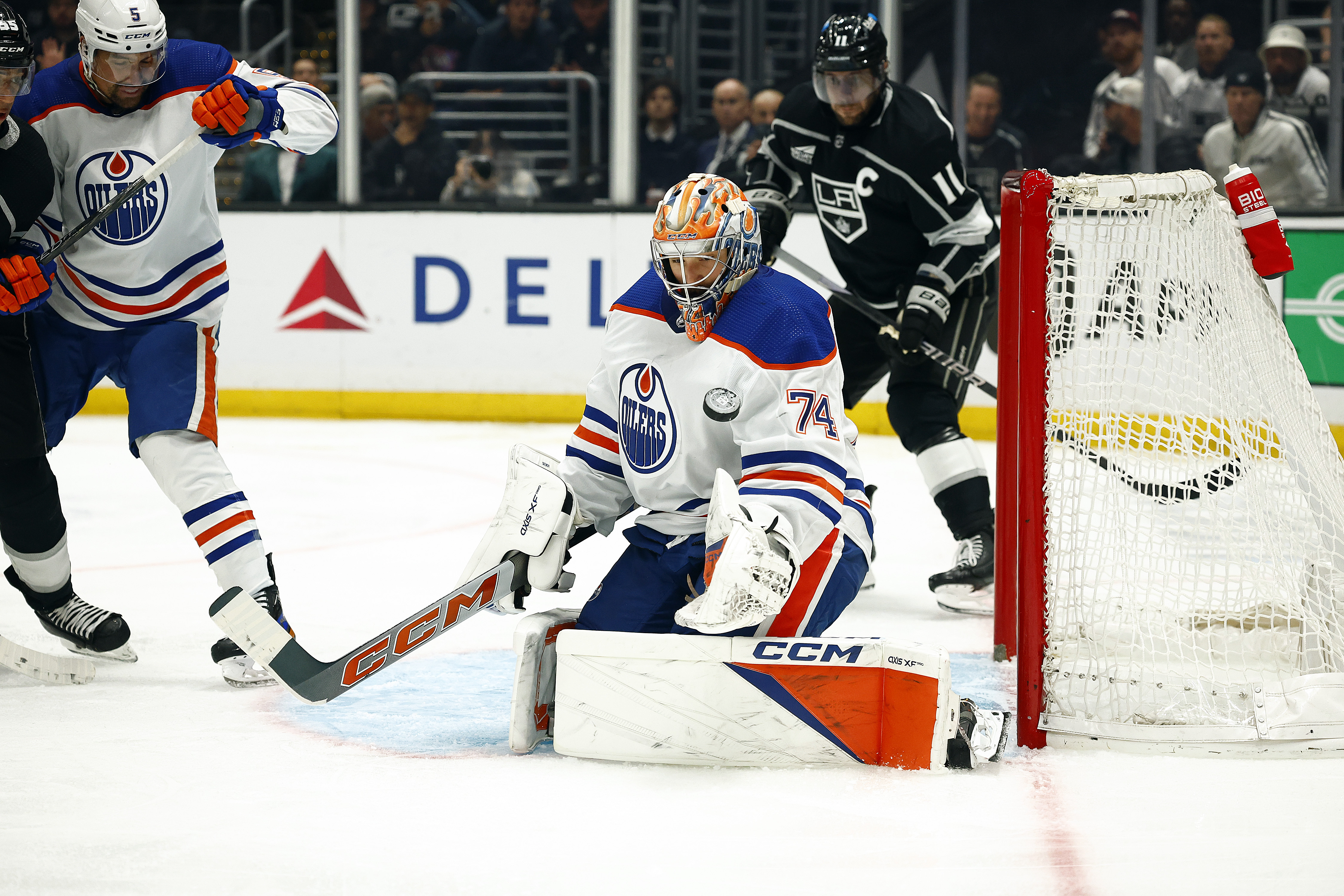 Stuart Skinner #74 of the Edmonton Oilers makes a save...