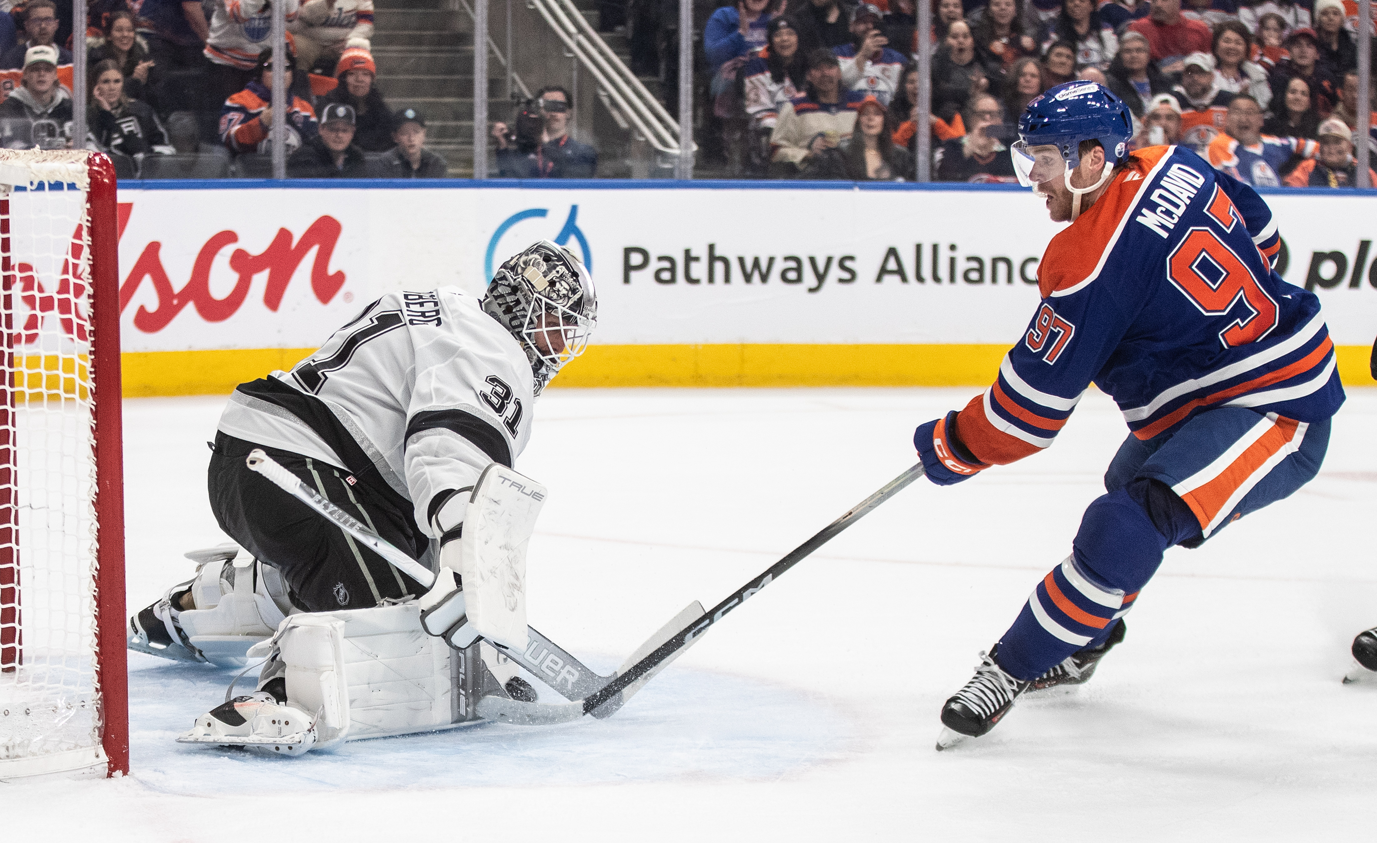 Kings goalie Anton Forsberg (31) makes the save on Edmonton...
