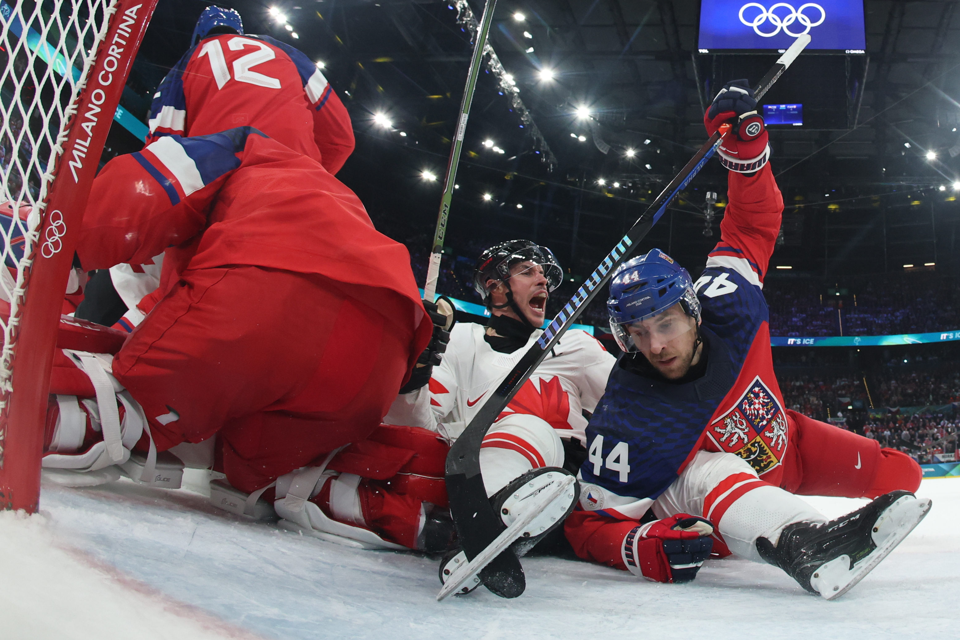 Canada’s Sidney Crosby (87), second from right, and Czechia’s Jan...