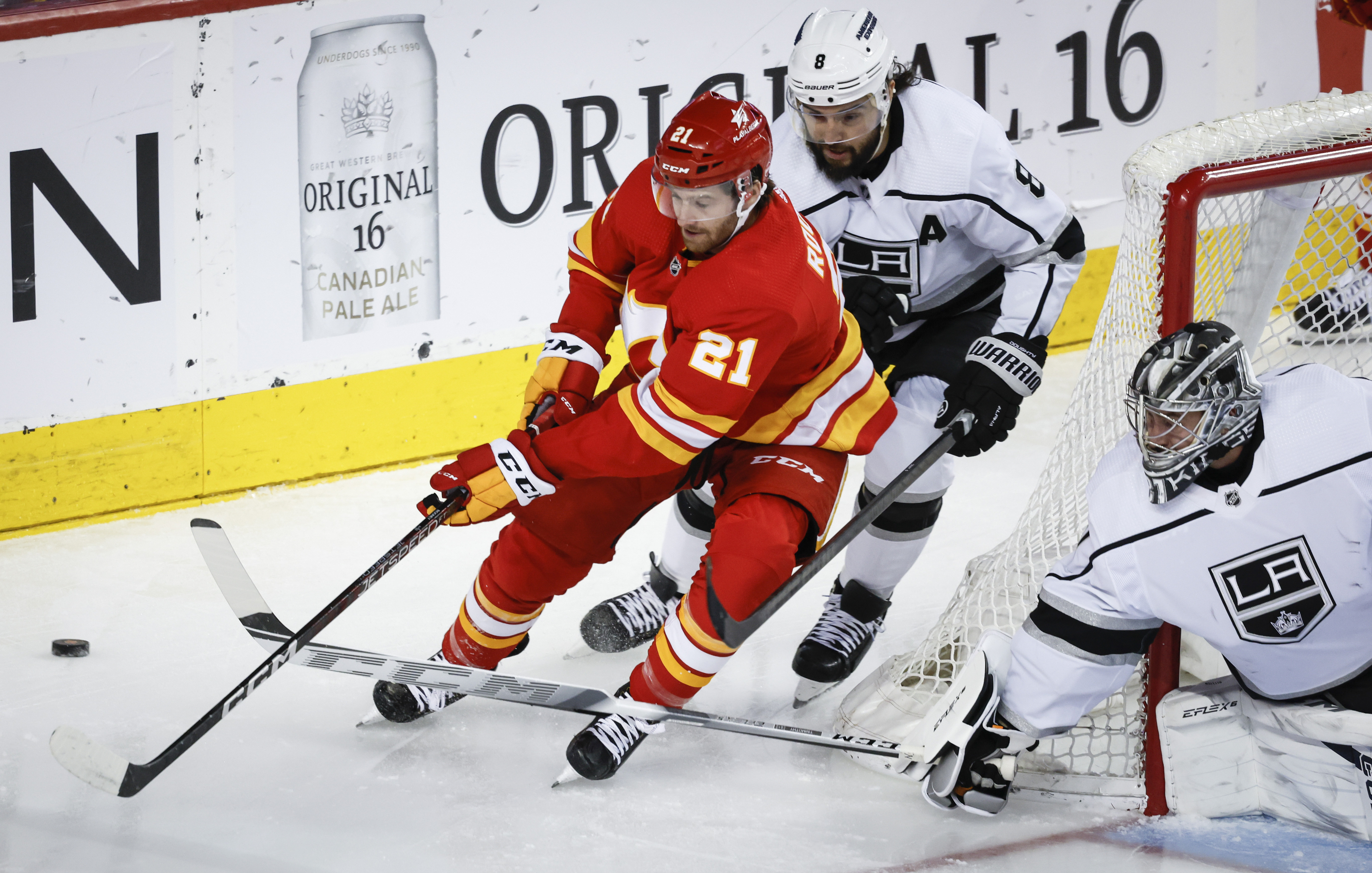 Los Angeles Kings goalie David Rittich (31) swats the puck...