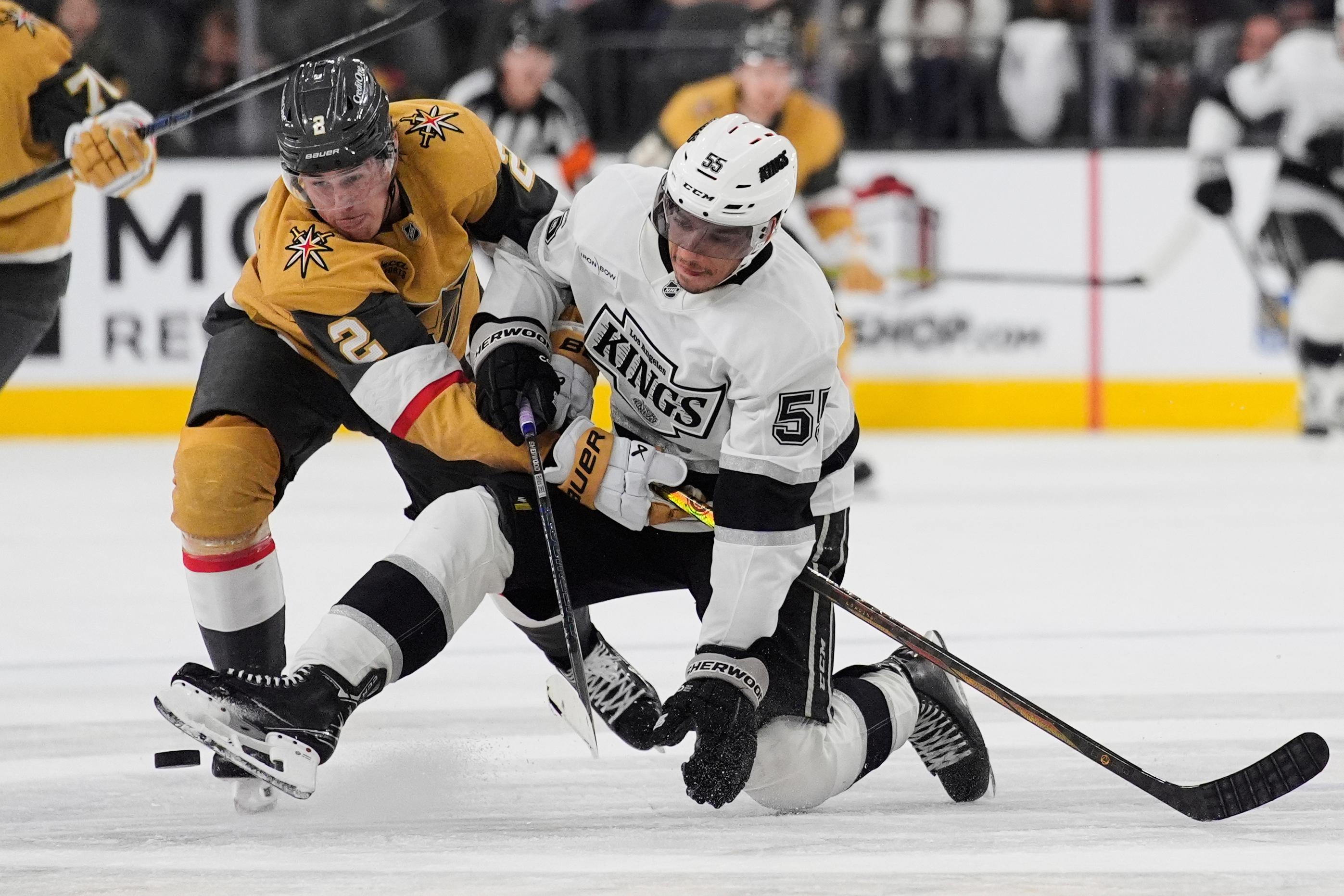 Vegas Golden Knights defenseman Zach Whitecloud (2) and Kings right...