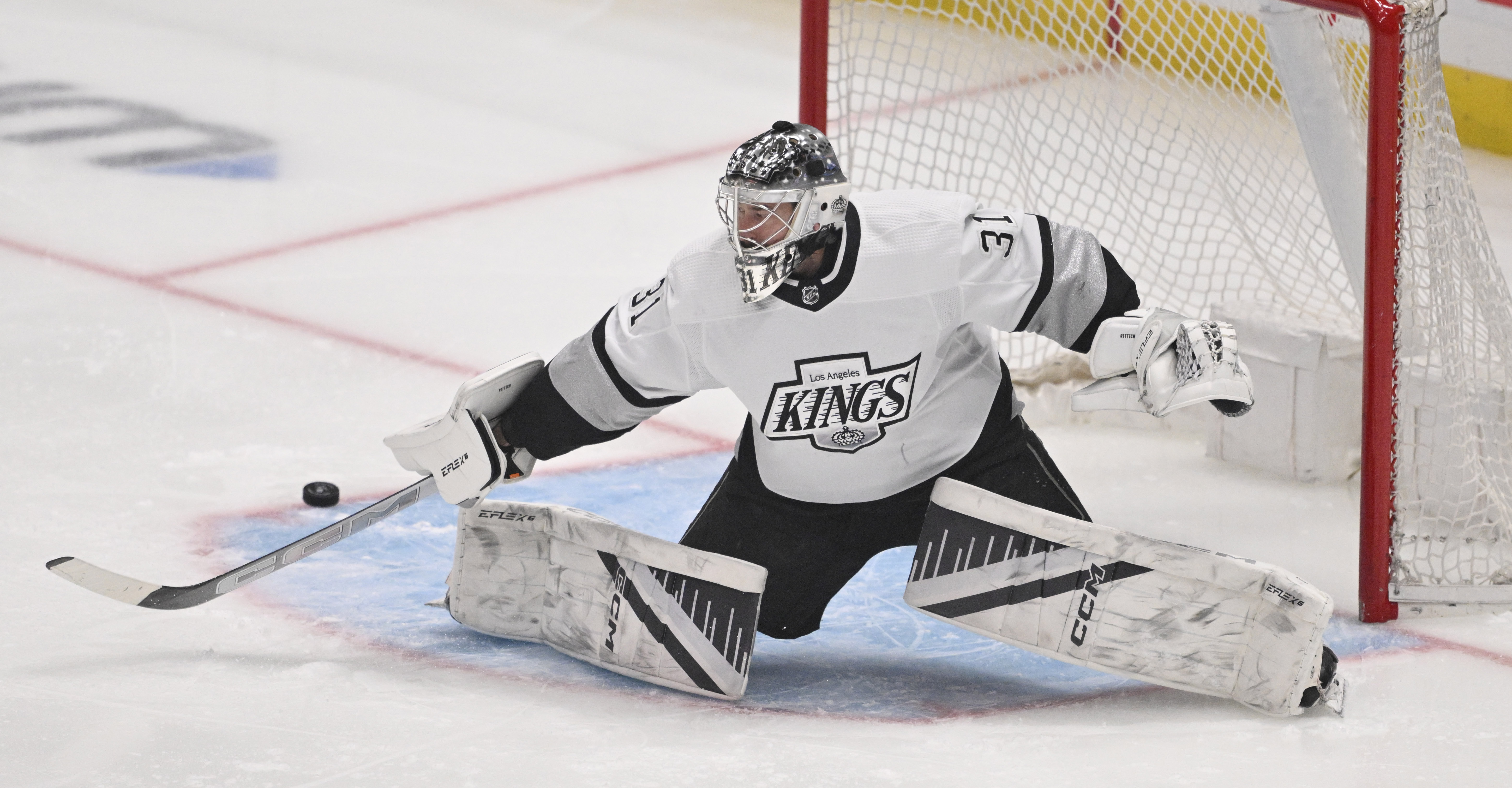 Goalie David Rittich #31 of the Los Angeles Kings blocks...