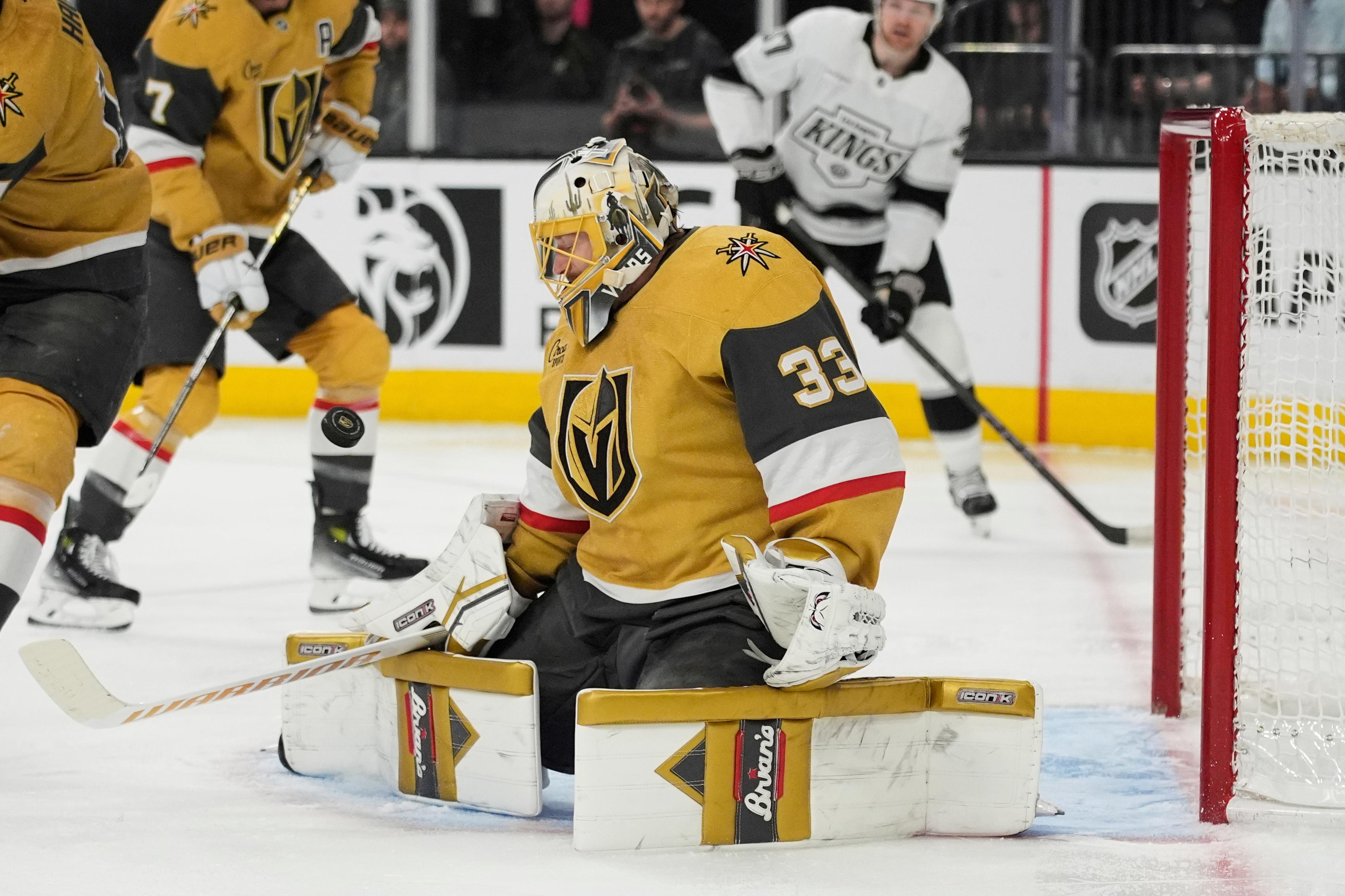 Vegas Golden Knights goaltender Adin Hill (33) blocks a shot...