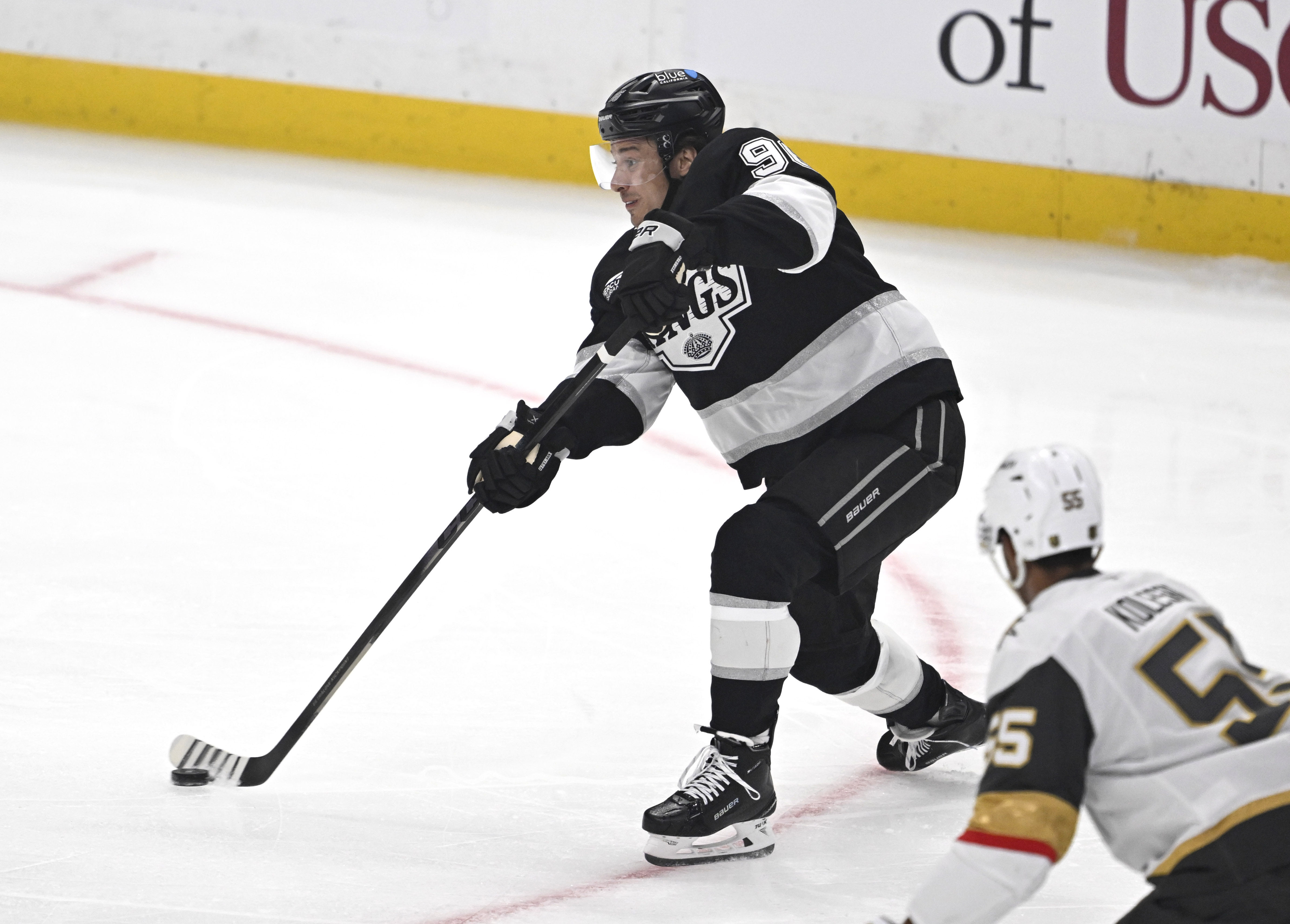 Kings left wing Andrei Kuzmenko takes a shot on goal...