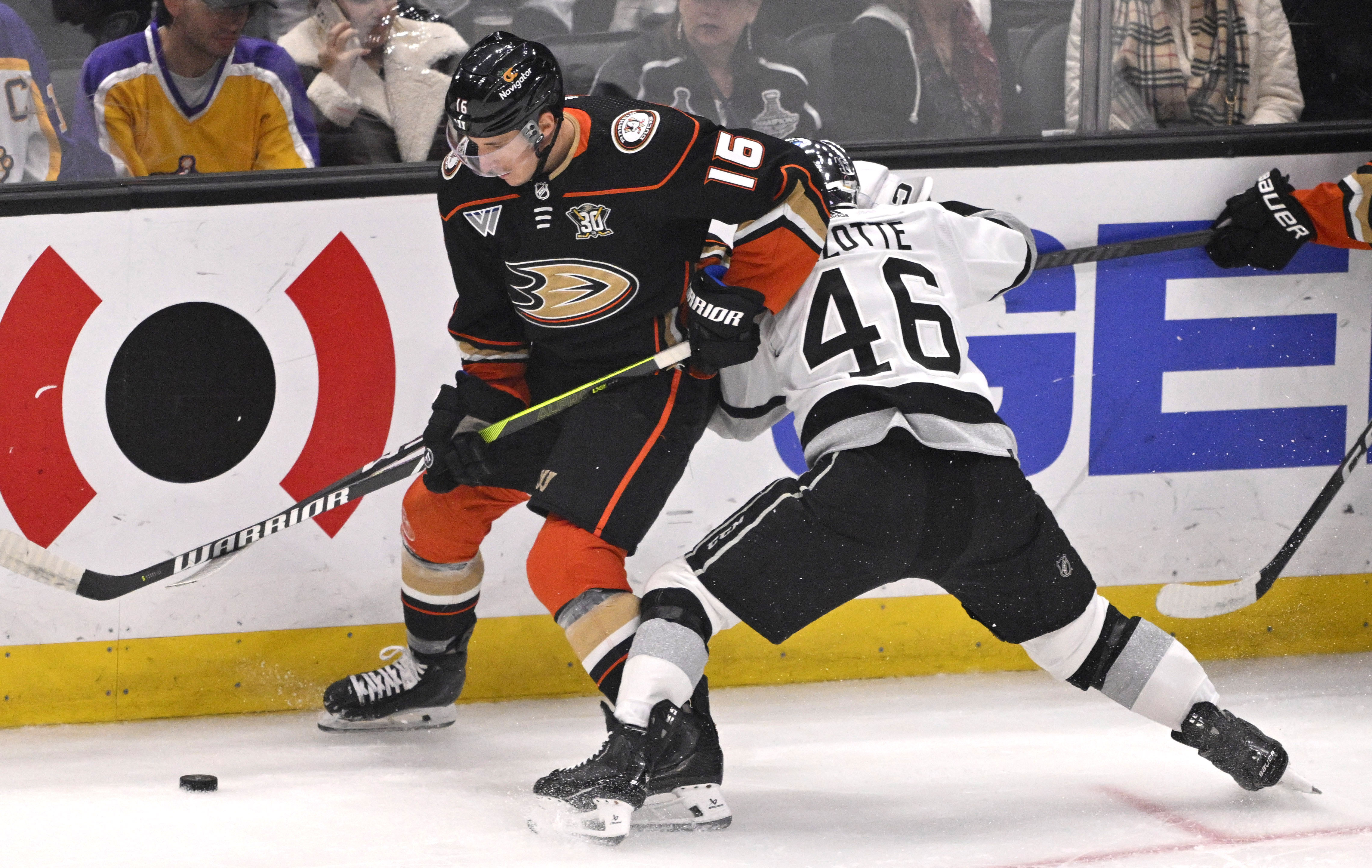Ryan Strome #16 of the Anaheim Ducks fights for the...