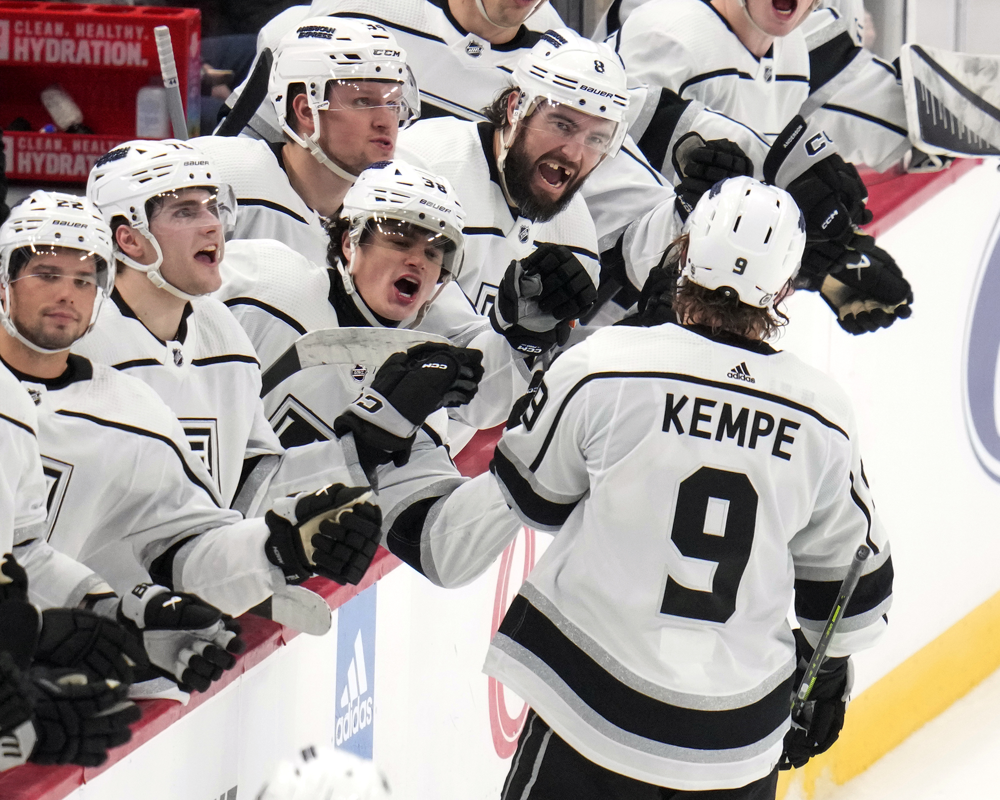 Los Angeles Kings’ Adrian Kempe (9) returns to the bench...