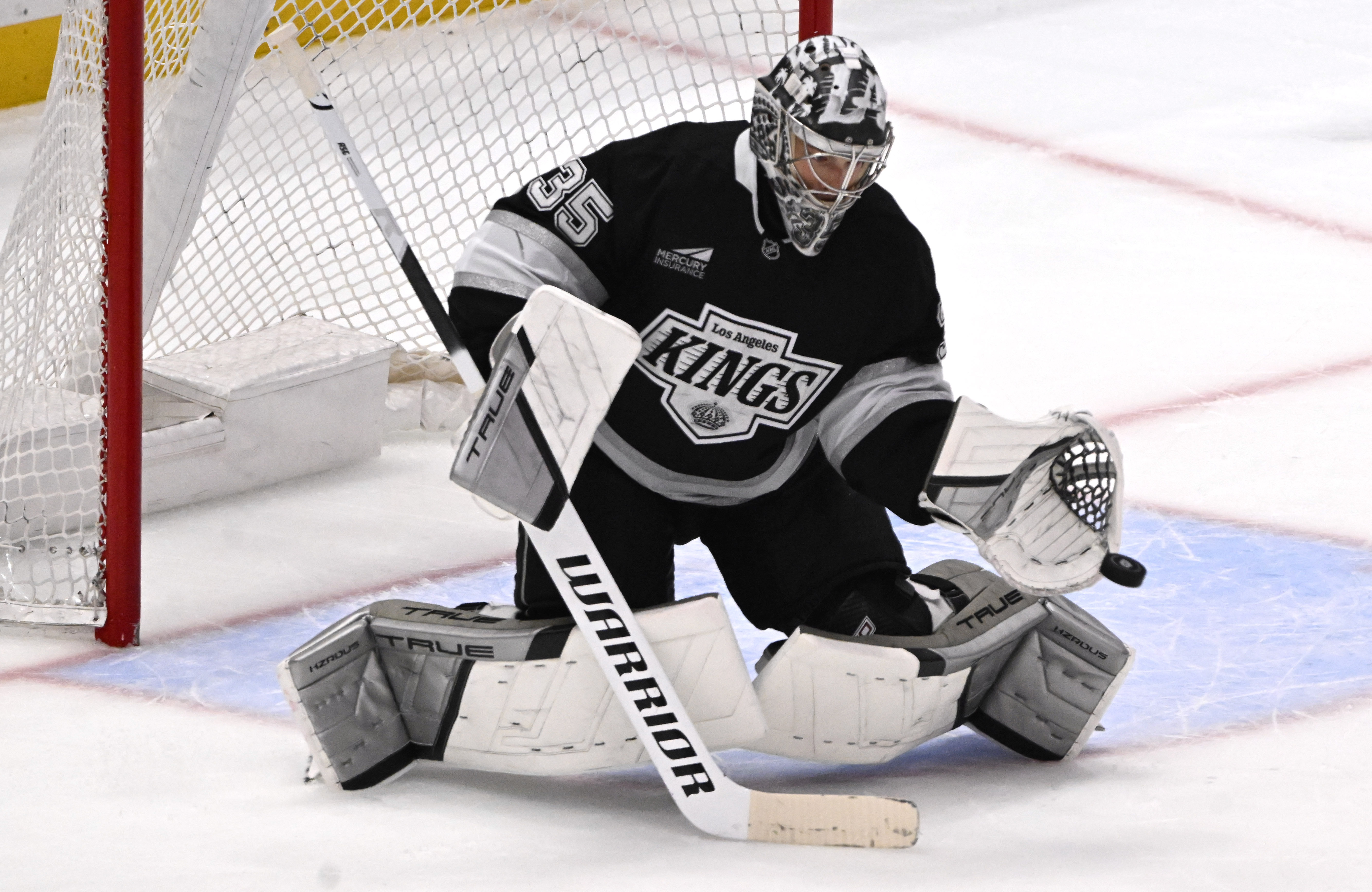 Kings goaltender Darcy Kuemper blocks a shot during the second...