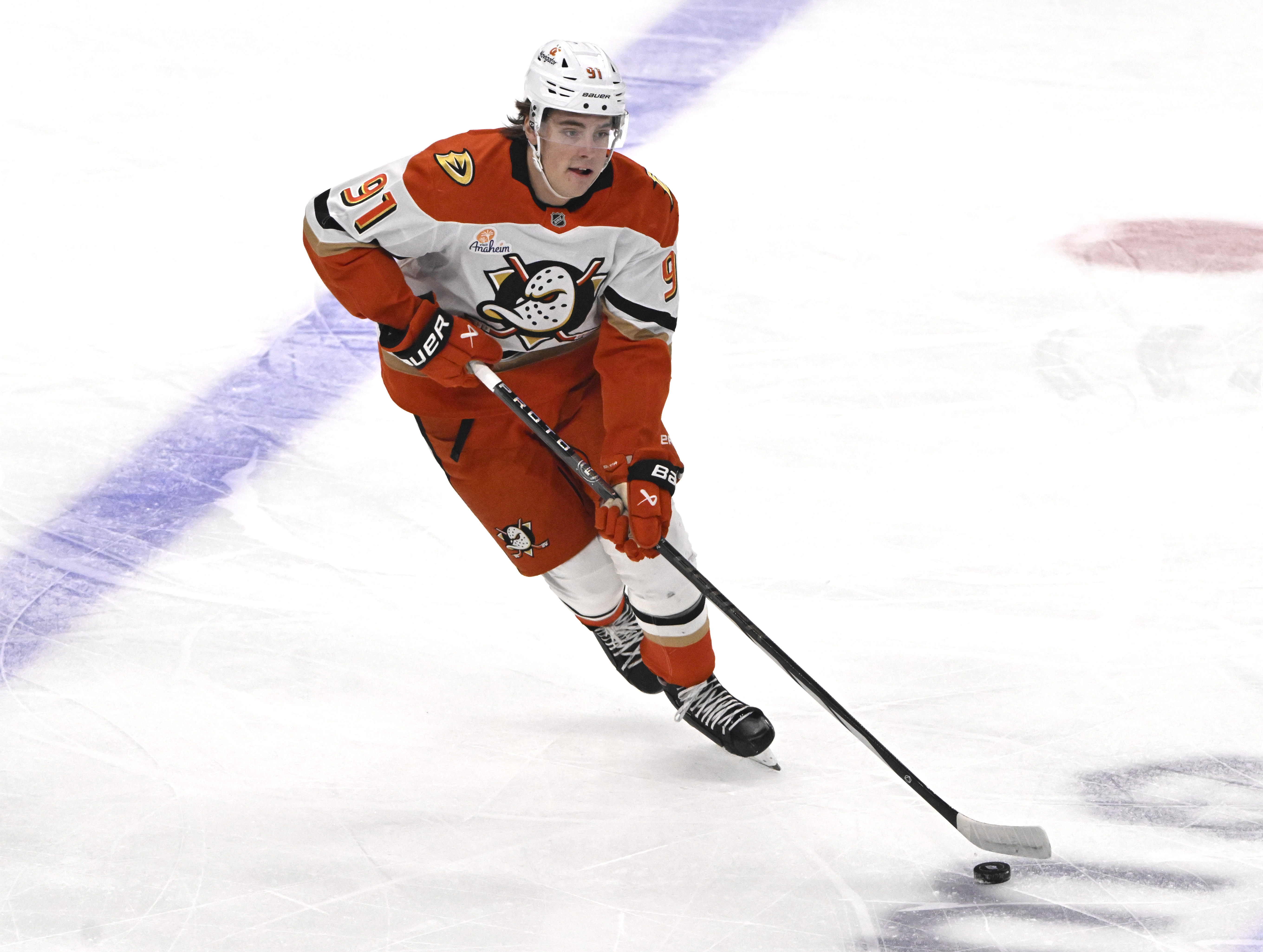 Ducks forward Leo Carlsson controls the puck during the first...