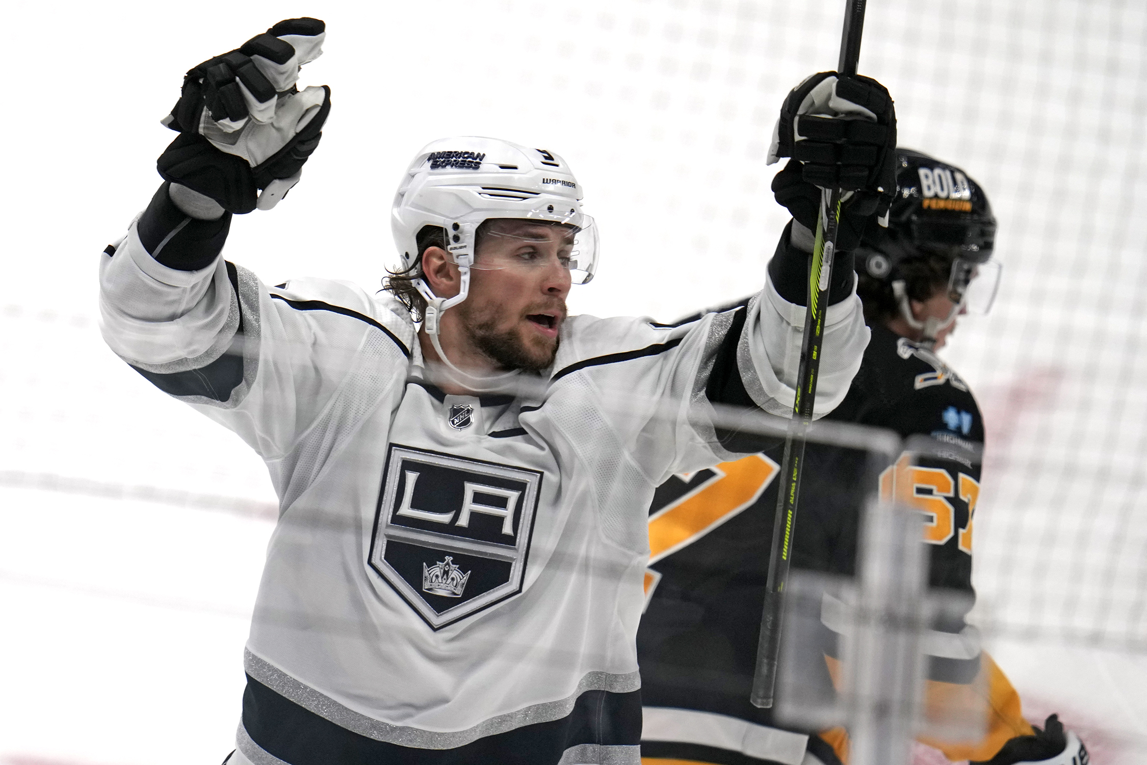 Los Angeles Kings’ Adrian Kempe, left, celebrates after his goal...