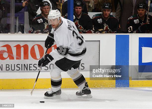los-angeles-right-wing-ziggy-palffy-of-the-los-angeles-kings-skates-with-the-puck-against-the.jpg