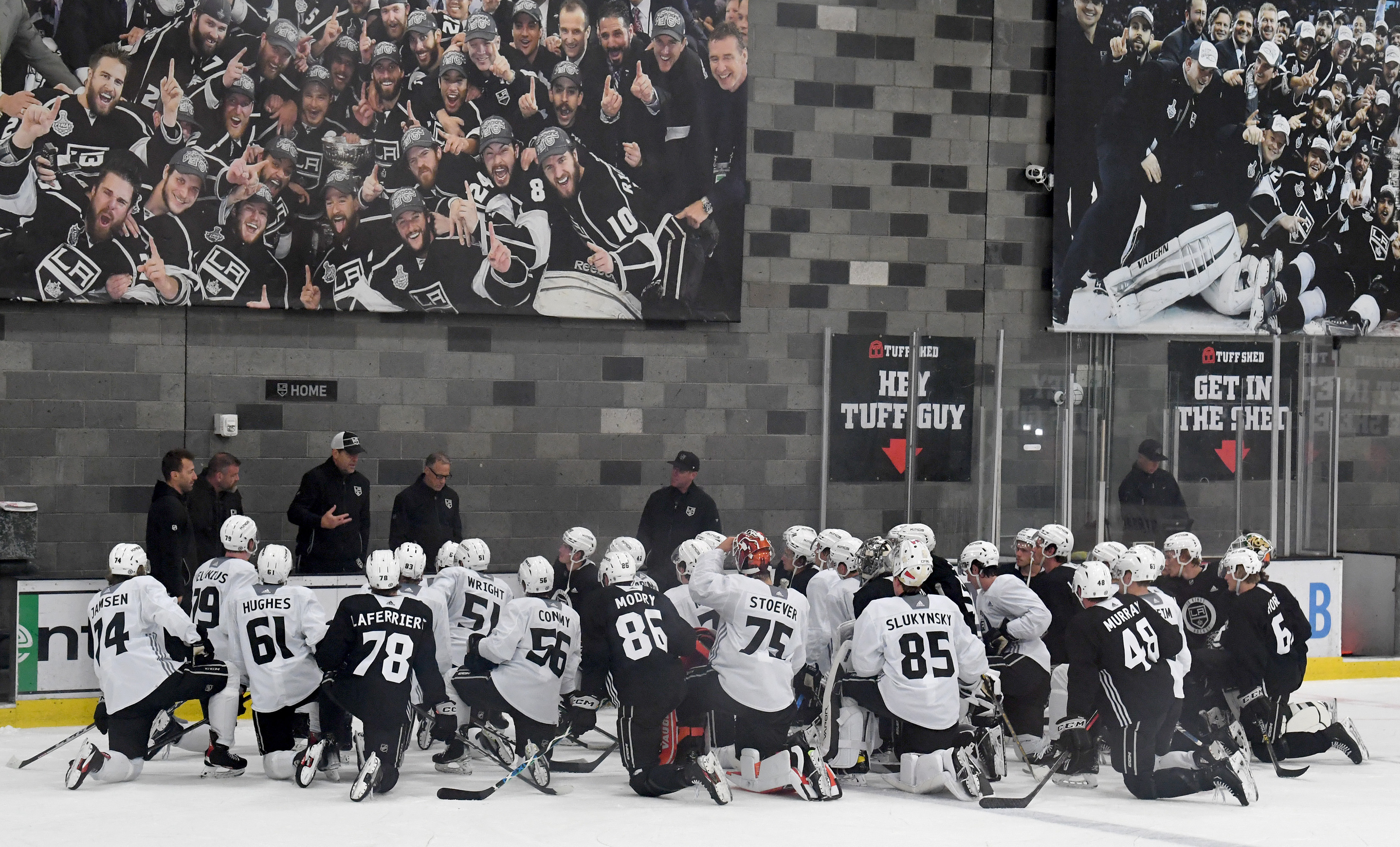 Kings’ recruits huddle after a scrimmage at the conclusion of...